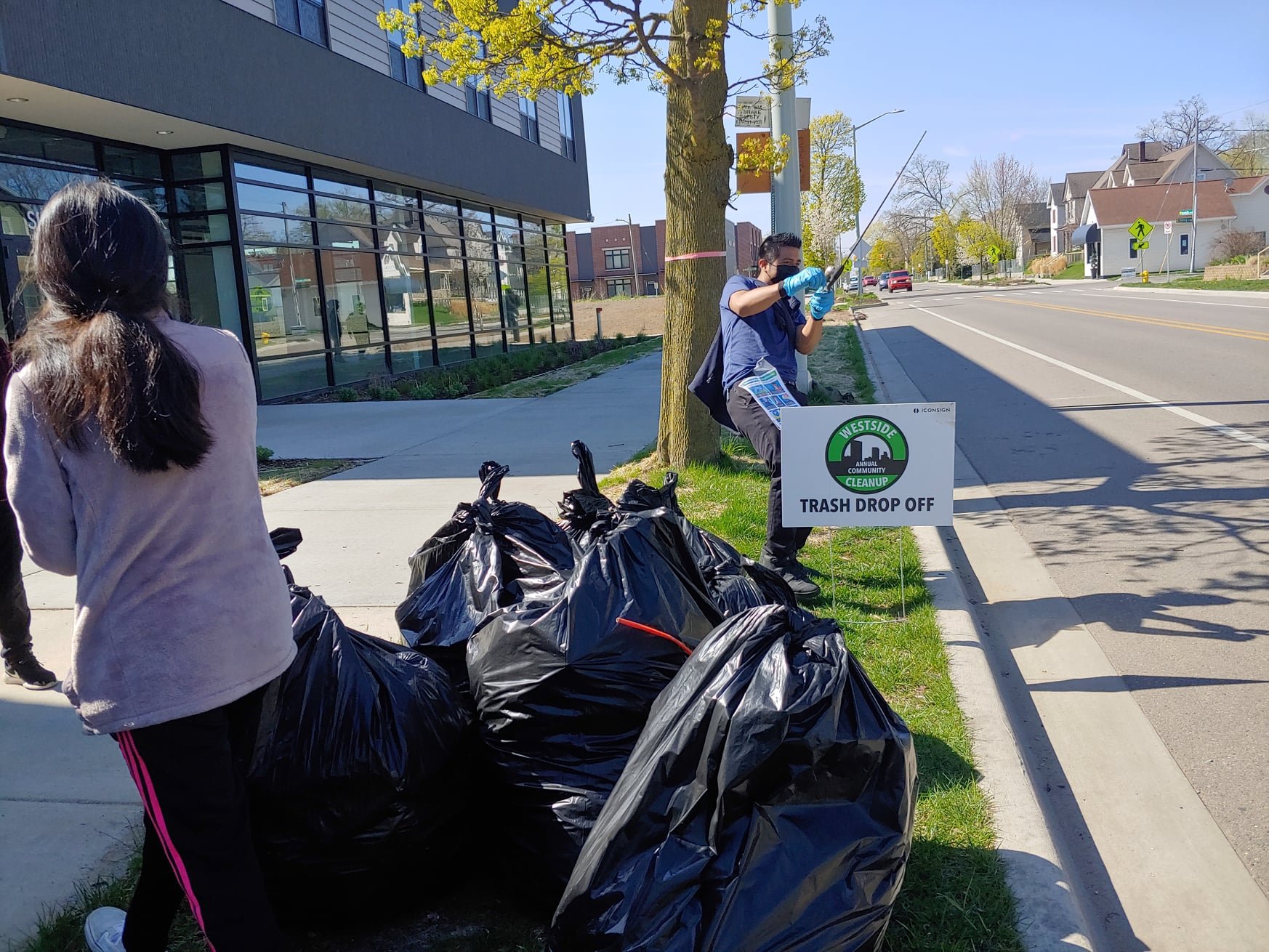 Volunteers with some trash collected in the Roosevelt Park Neighborhood
