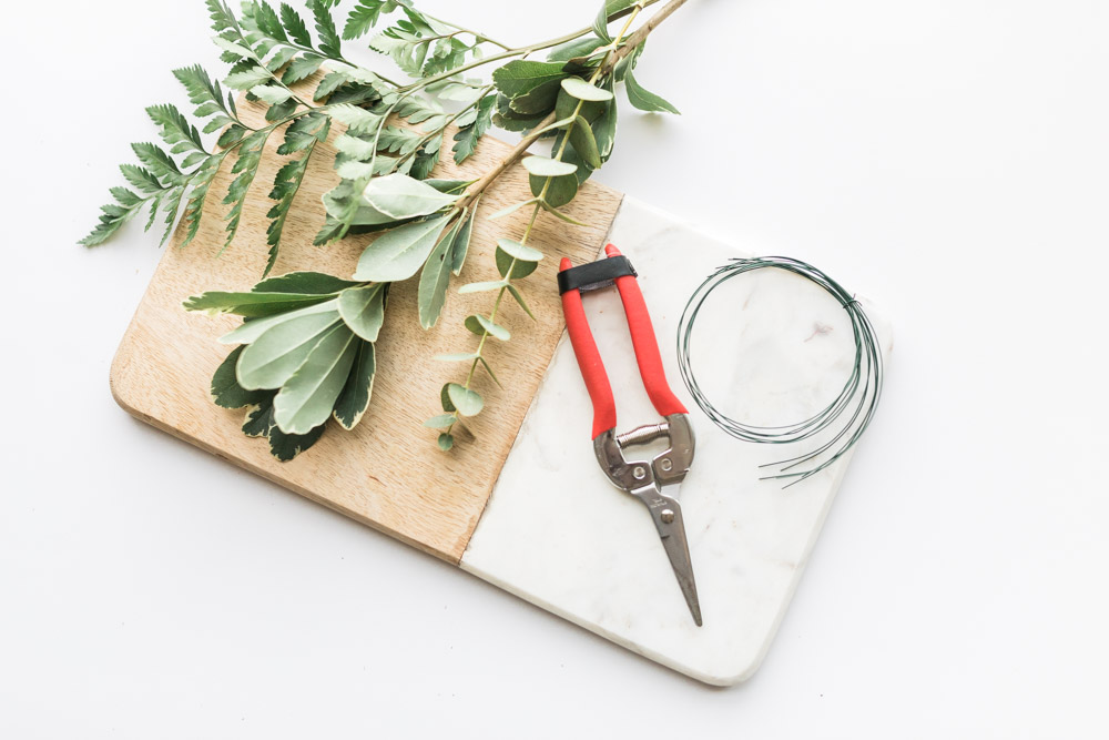 DIY foliage, greenery napkin ring with eucalyptus for wedding reception