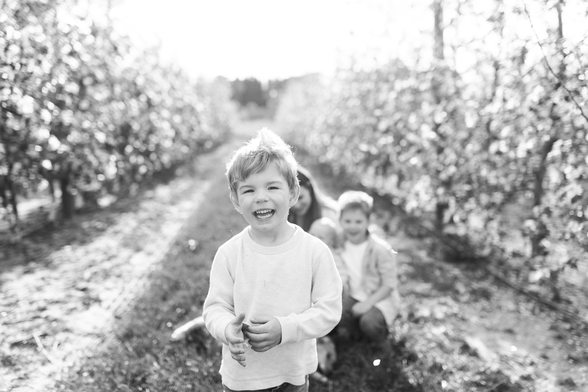 Family Mini Session | Brothers | What to Wear | Family Photos | Orchard with Spring Blooms | Laurenda Marie Photography
