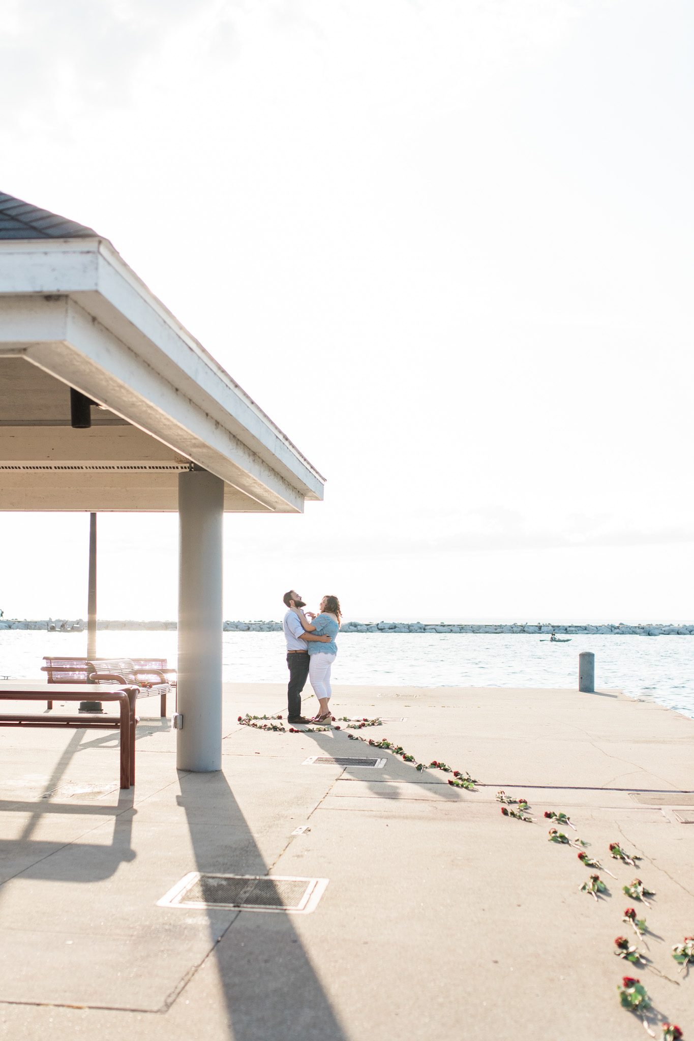 Romantic Petoskey Michigan Proposal on the Pier with Rose Trail | How He Asked | She Said Yes | Laurenda Marie Photography