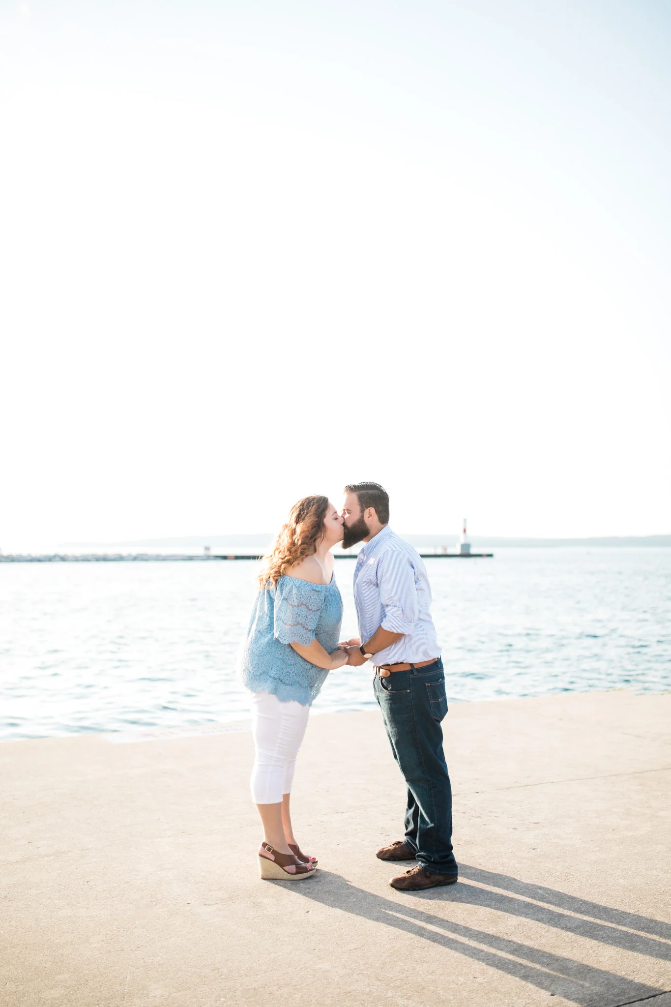 Romantic Petoskey Michigan Proposal on the Pier with Rose Trail | How He Asked | She Said Yes | Laurenda Marie Photography