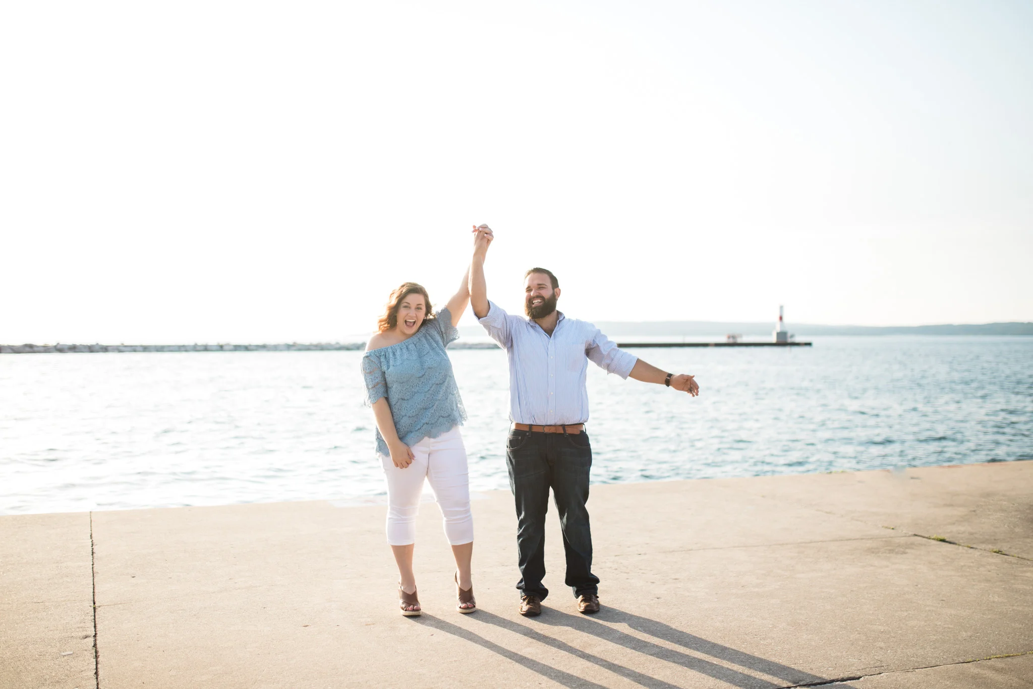 Romantic Petoskey Michigan Proposal on the Pier with Rose Trail | How He Asked | She Said Yes | Laurenda Marie Photography