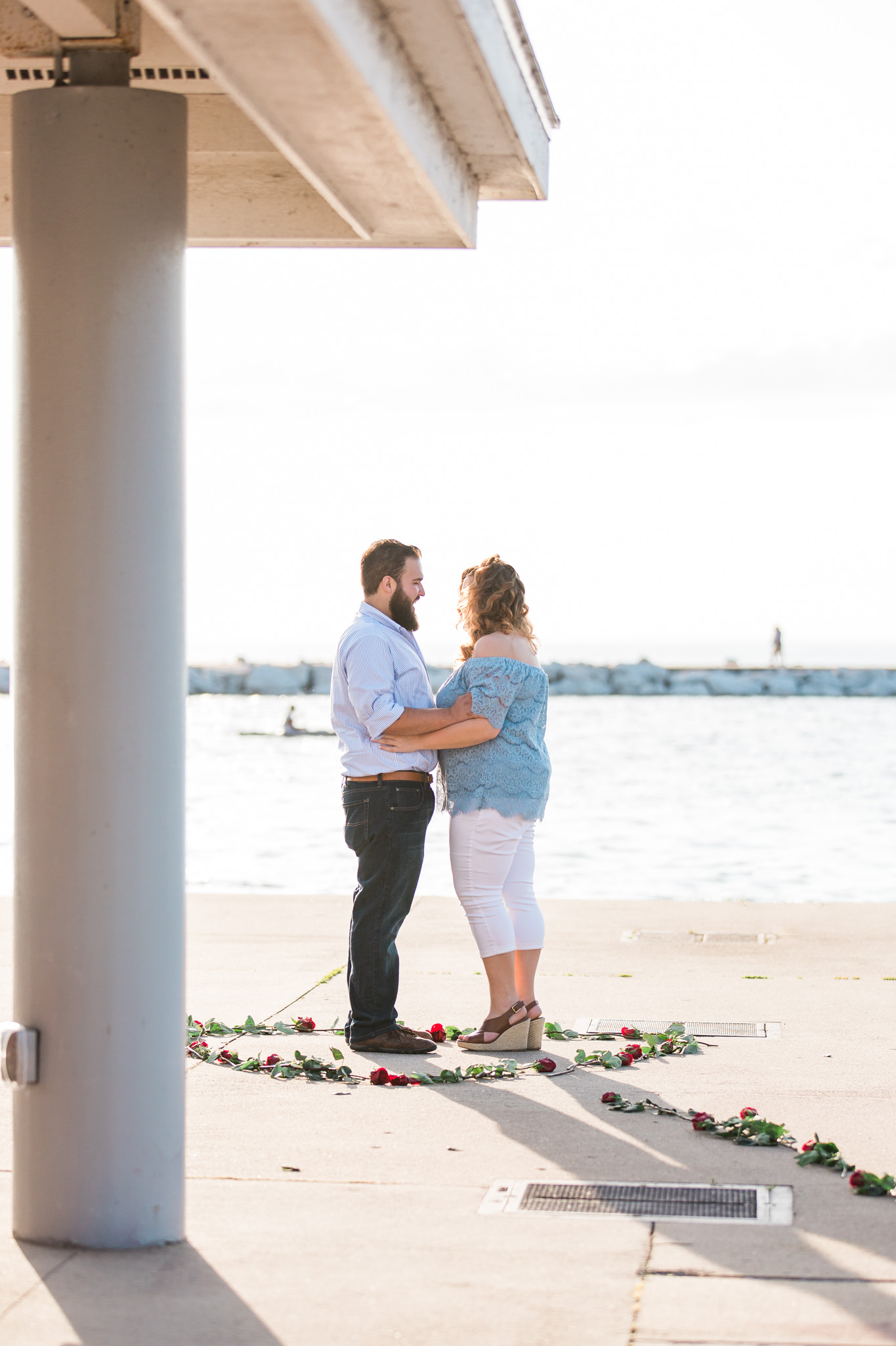  Romantic Petoskey Michigan Proposal on the Pier with Rose Trail | How He Asked | She Said Yes | Laurenda Marie Photography 