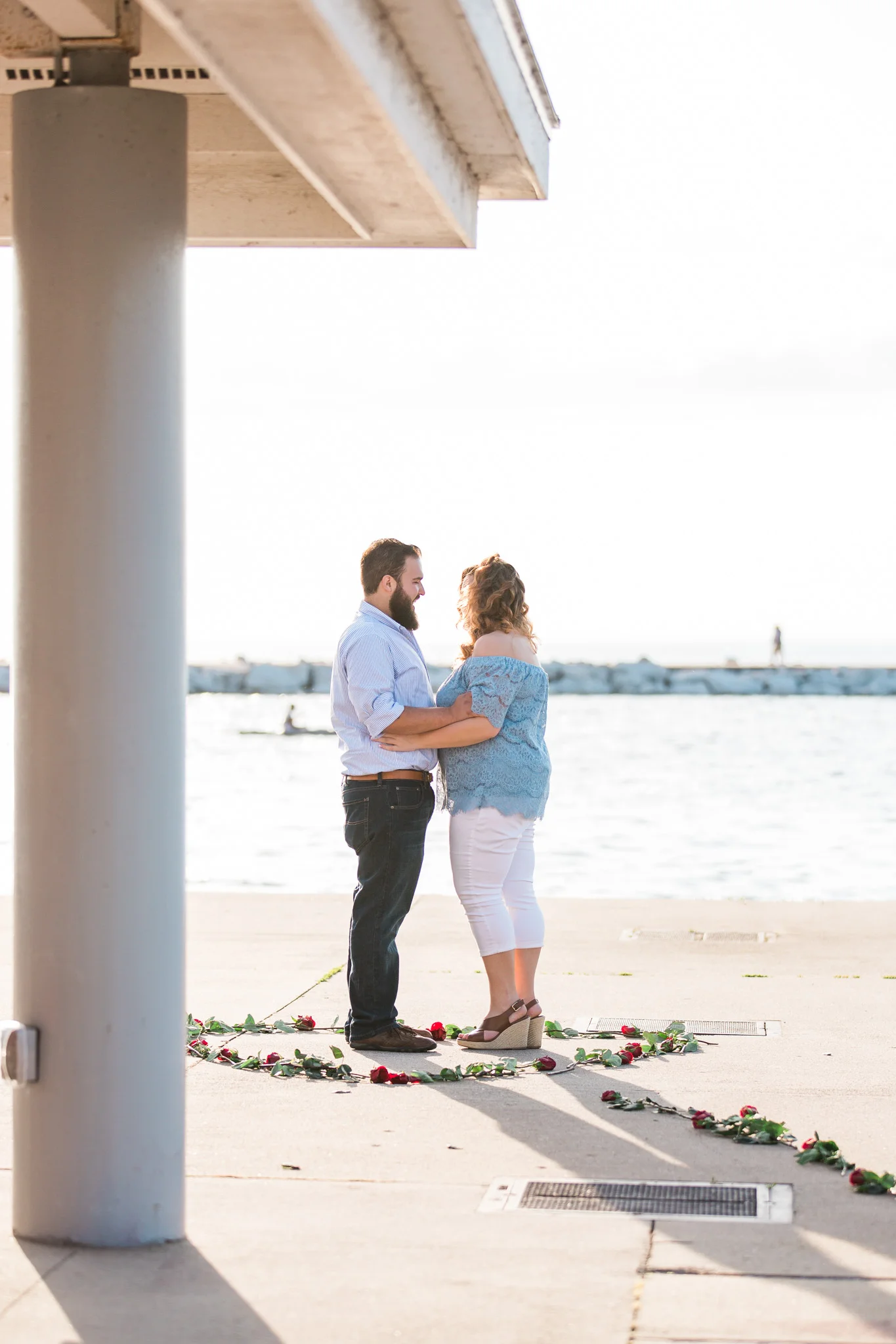 Romantic Petoskey Michigan Proposal on the Pier with Rose Trail | How He Asked | She Said Yes | Laurenda Marie Photography