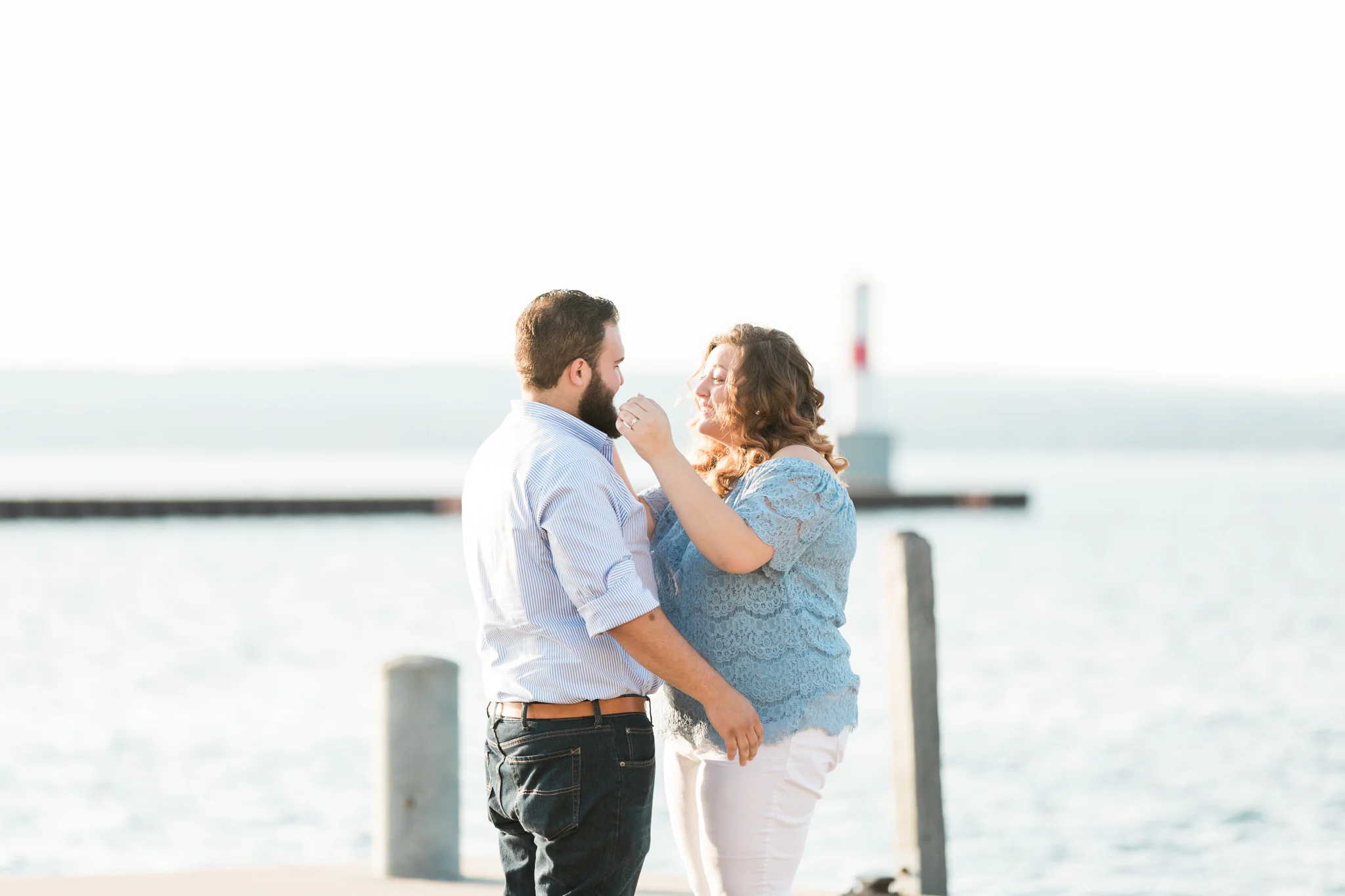 Romantic Petoskey Michigan Proposal on the Pier with Rose Trail | How He Asked | She Said Yes | Laurenda Marie Photography
