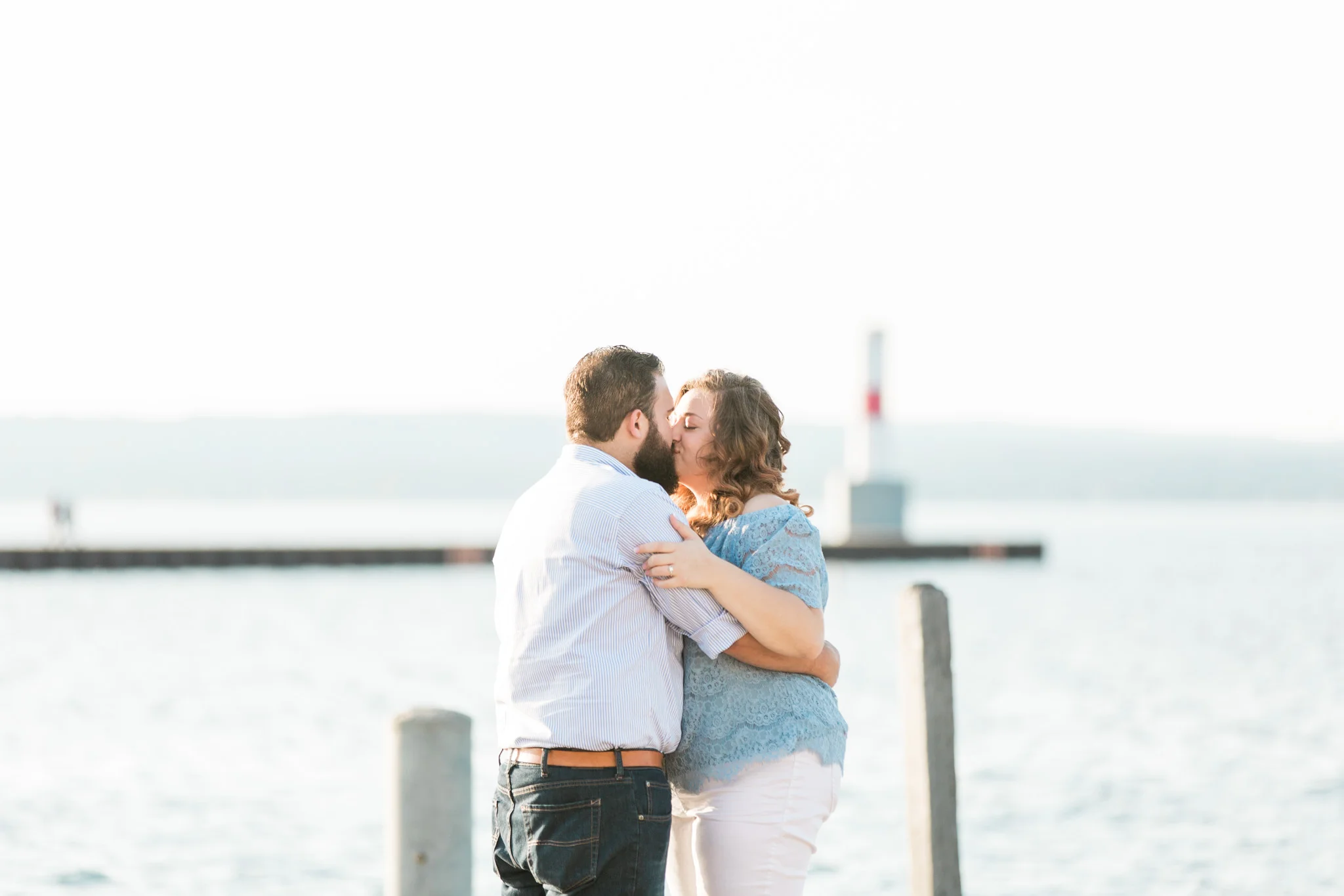 Romantic Petoskey Michigan Proposal on the Pier with Rose Trail | How He Asked | She Said Yes | Laurenda Marie Photography