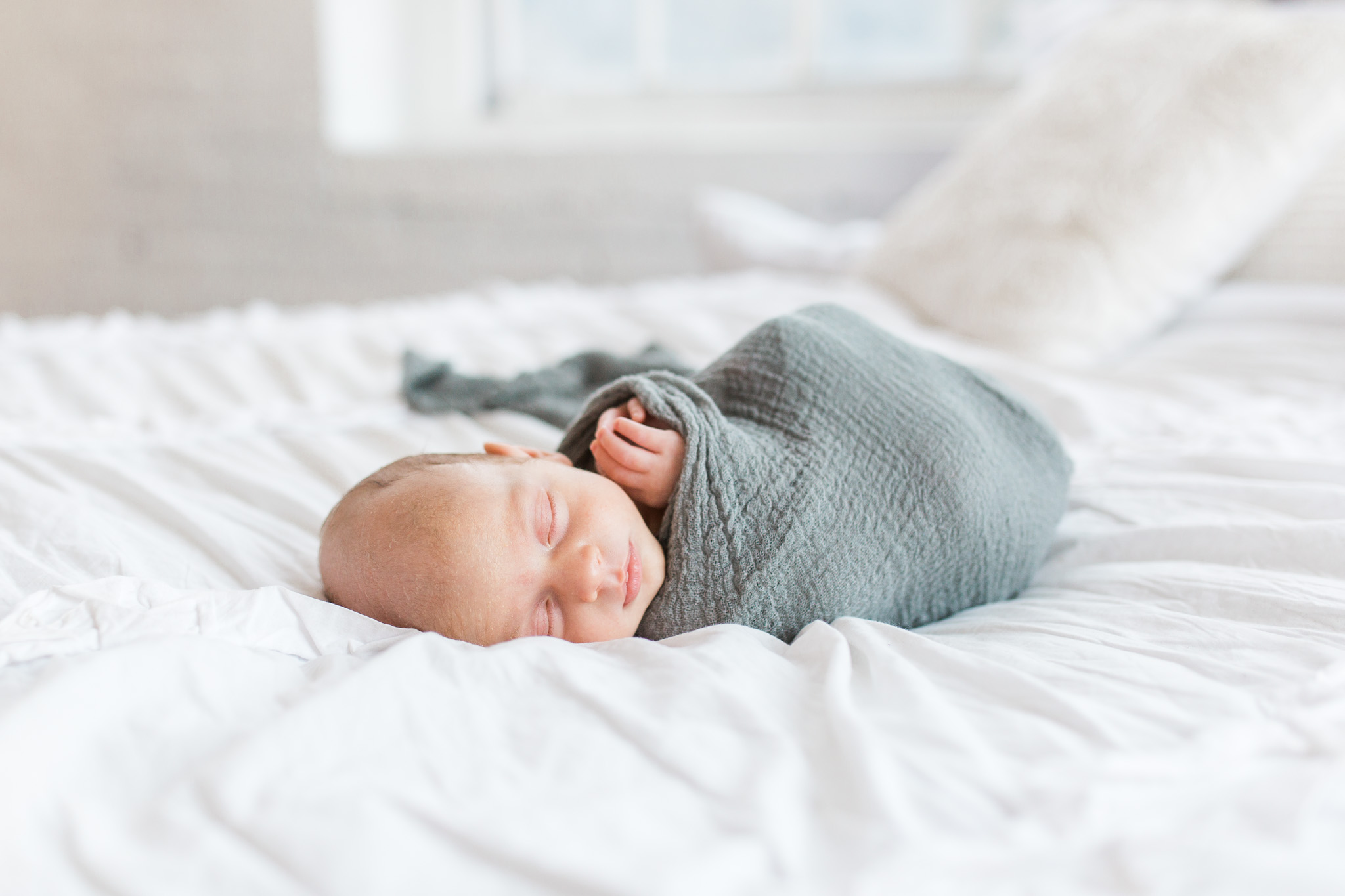 White Studio Newborn Lifestyle Session with New Parents | Laurenda Marie Photography | Grand Rapids, Michigan