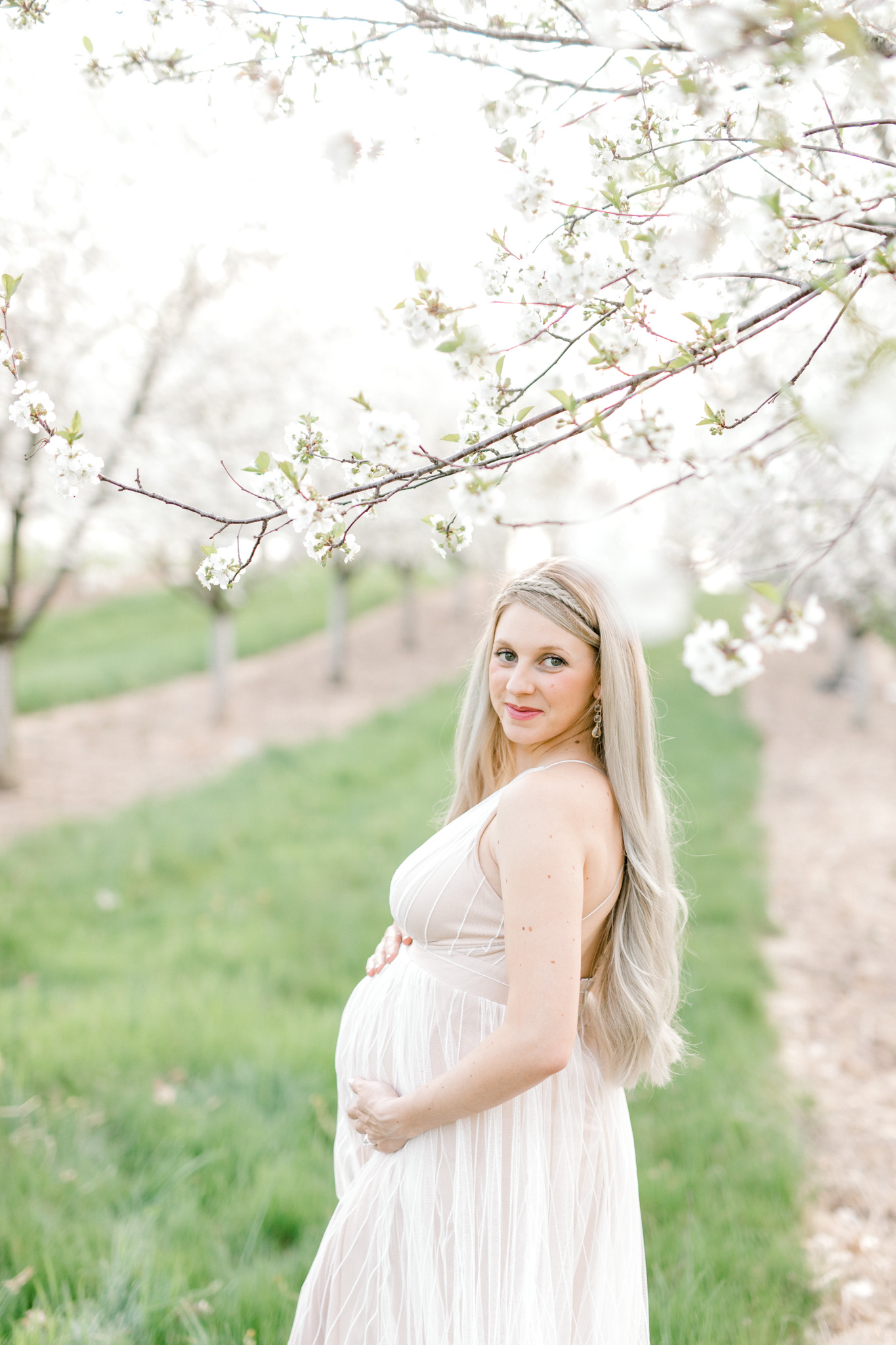 Spring Cherry Blossom Maternity Session in Mattawan Michigan | Light and Airy Maternity Photos | Couples Maternity | Laurenda Marie Photography