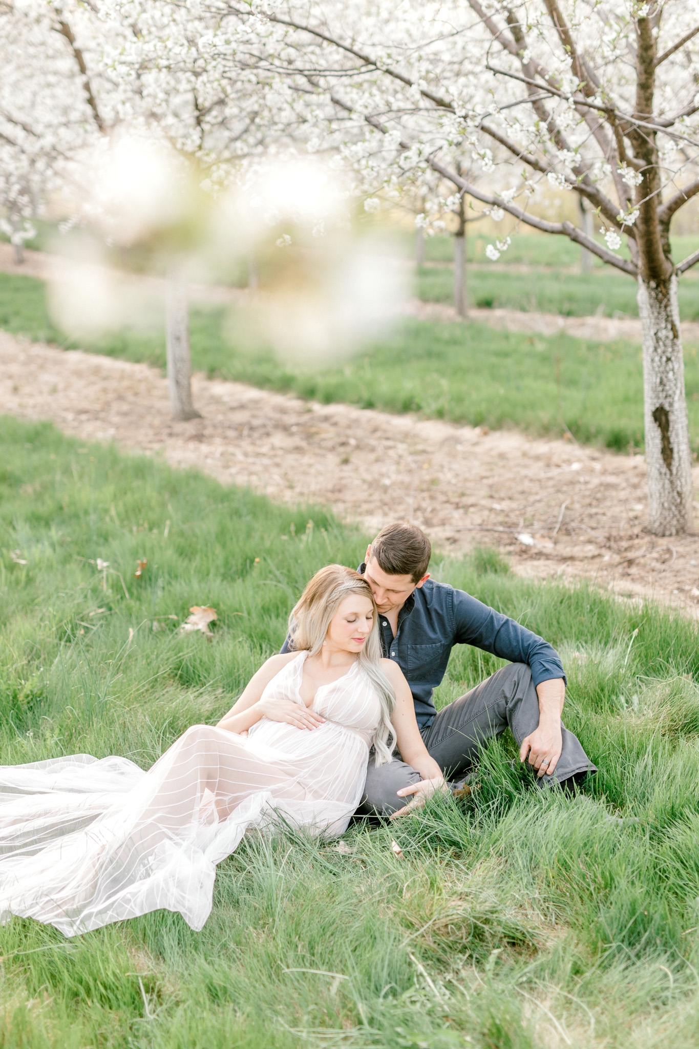 Spring Cherry Blossom Maternity Session in Mattawan Michigan | Light and Airy Maternity Photos | Couples Maternity | Laurenda Marie Photography