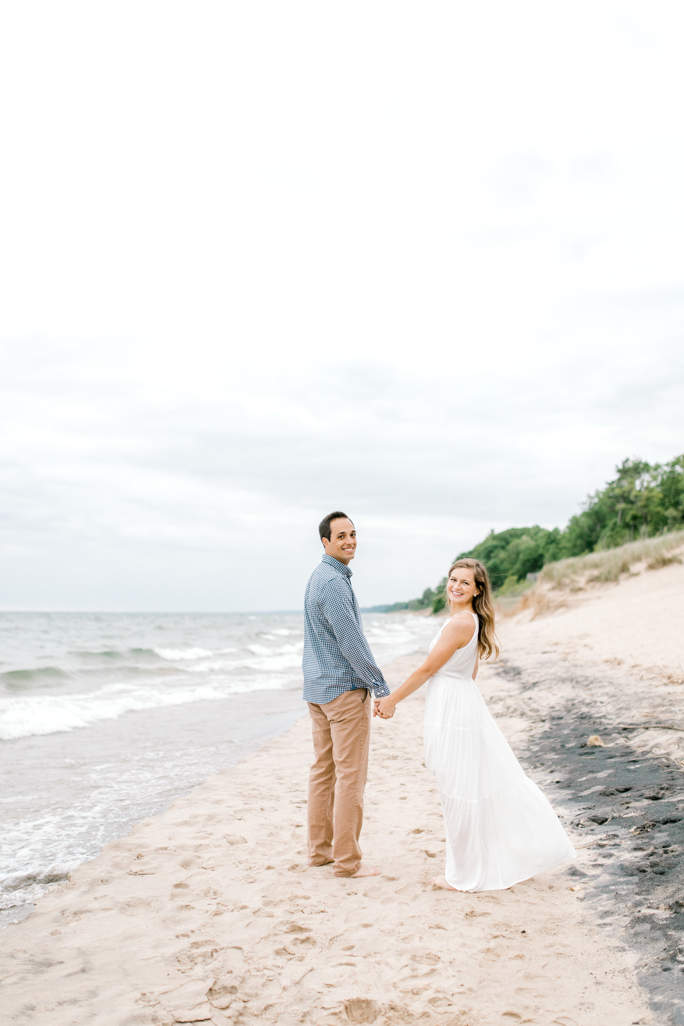 Dreamy Lake Michigan Beach Session | West Michigan Engagement | Cloudy Beach Session | Laurenda Marie Photography | West Michigan Wedding Photographer