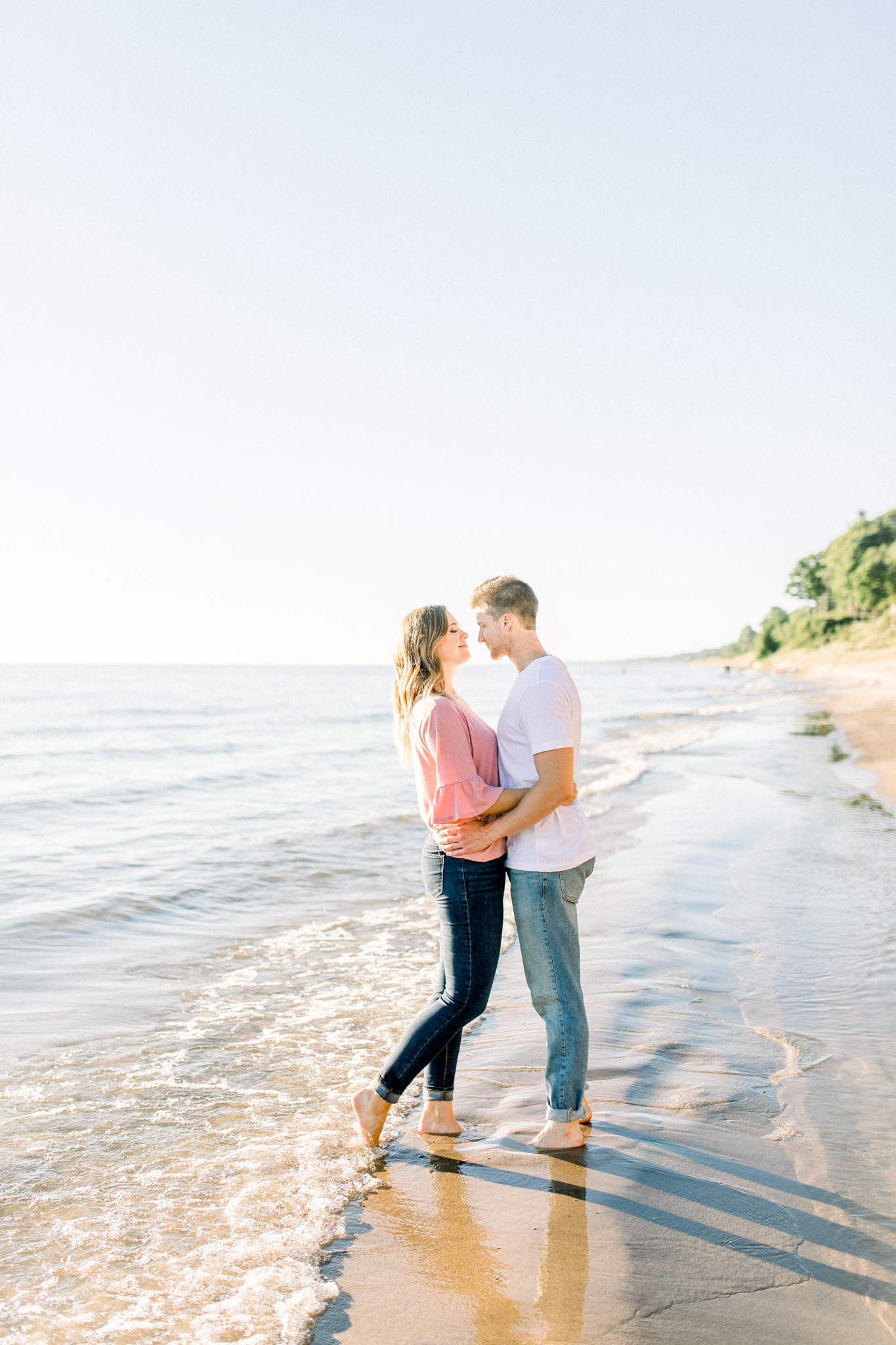 Beautiful Summer Shoreline Engagement Session on Lake Michigan | Beach Engagement | Laurenda Marie Photography | What to Wear to an Engagement Session | West Michigan Wedding Photographer
