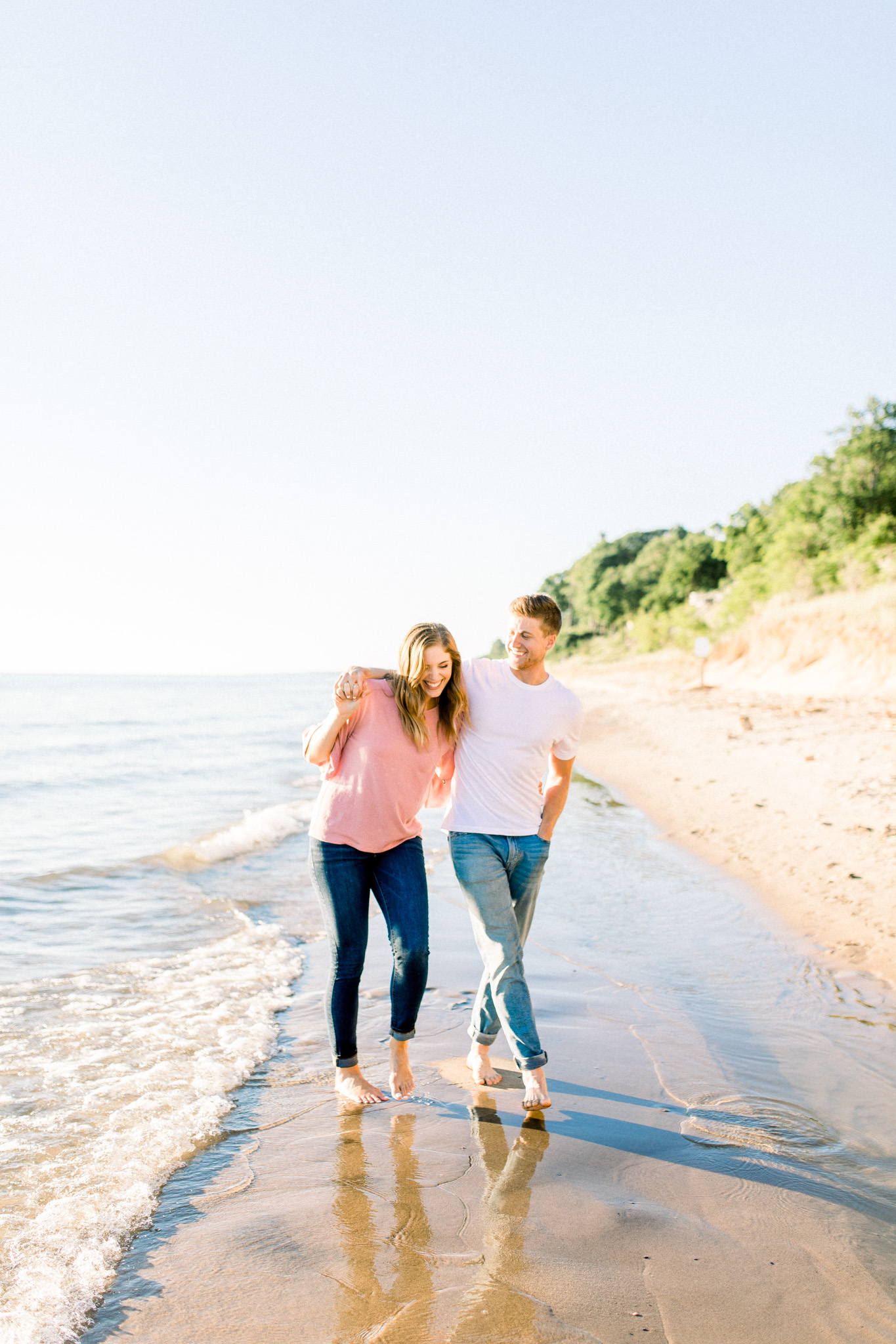 Beautiful Summer Shoreline Engagement Session on Lake Michigan | Beach Engagement | Laurenda Marie Photography | What to Wear to an Engagement Session | West Michigan Wedding Photographer