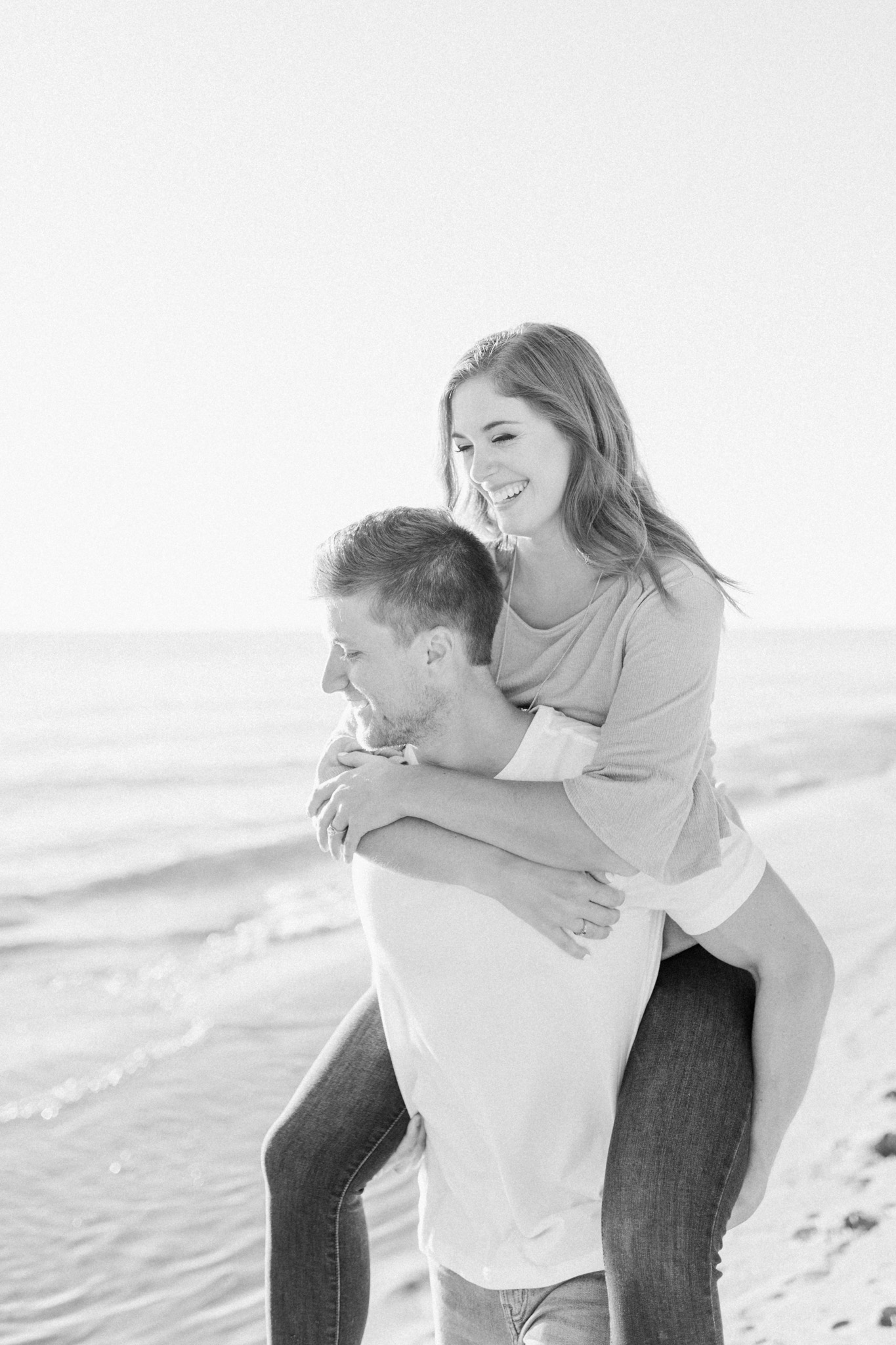 Beautiful Summer Shoreline Engagement Session on Lake Michigan | Beach Engagement | Laurenda Marie Photography | What to Wear to an Engagement Session | West Michigan Wedding Photographer