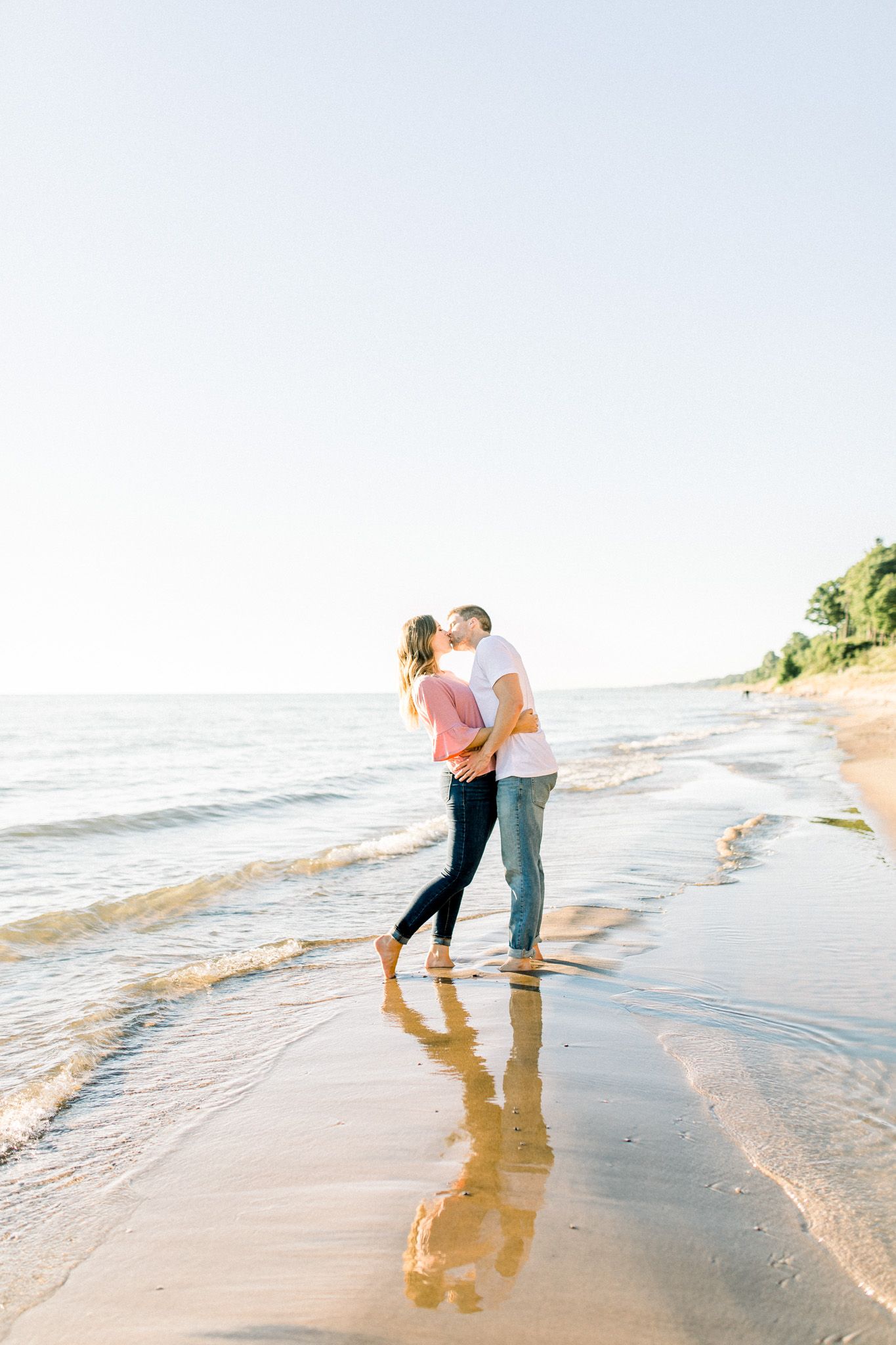 Beautiful Summer Shoreline Engagement Session on Lake Michigan | Beach Engagement | Laurenda Marie Photography | What to Wear to an Engagement Session | West Michigan Wedding Photographer