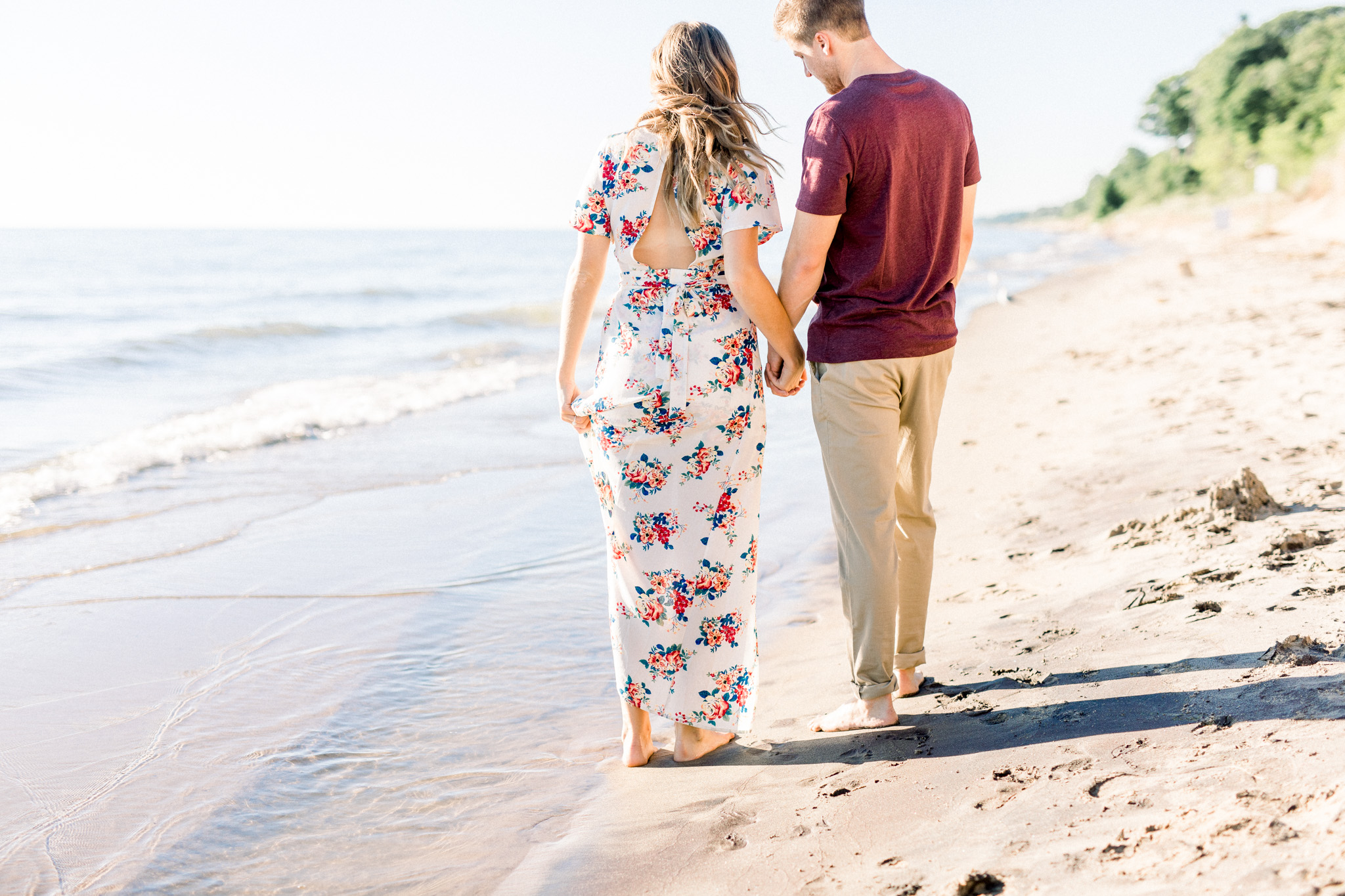 Beautiful Summer Shoreline Engagement Session on Lake Michigan | Beach Engagement | Laurenda Marie Photography | What to Wear to an Engagement Session | West Michigan Wedding Photographer