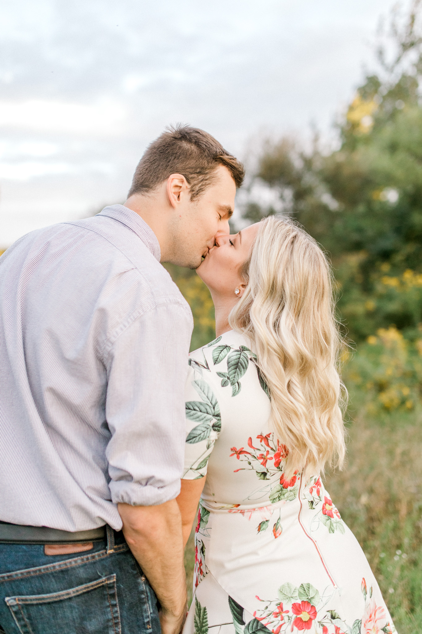 Summer engagement session | Wildflowers | Field engagement session | Floral Engagement Dress | West Michigan Wedding Photography