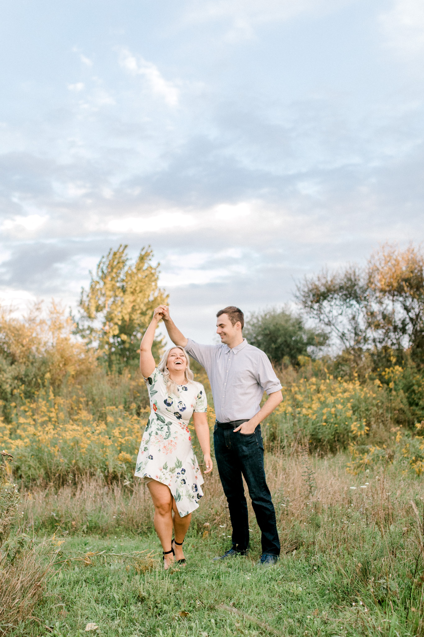 Summer engagement session | Wildflowers | Field engagement session | Floral Engagement Dress | West Michigan Wedding Photography