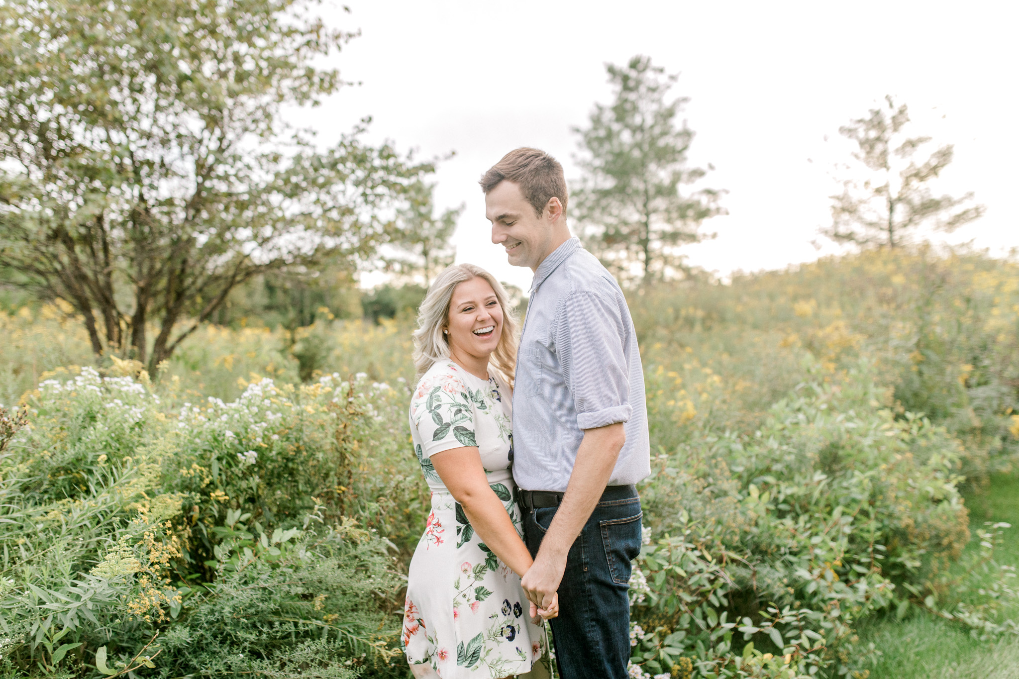 Summer engagement session | Wildflowers | Field engagement session | Floral Engagement Dress | West Michigan Wedding Photography