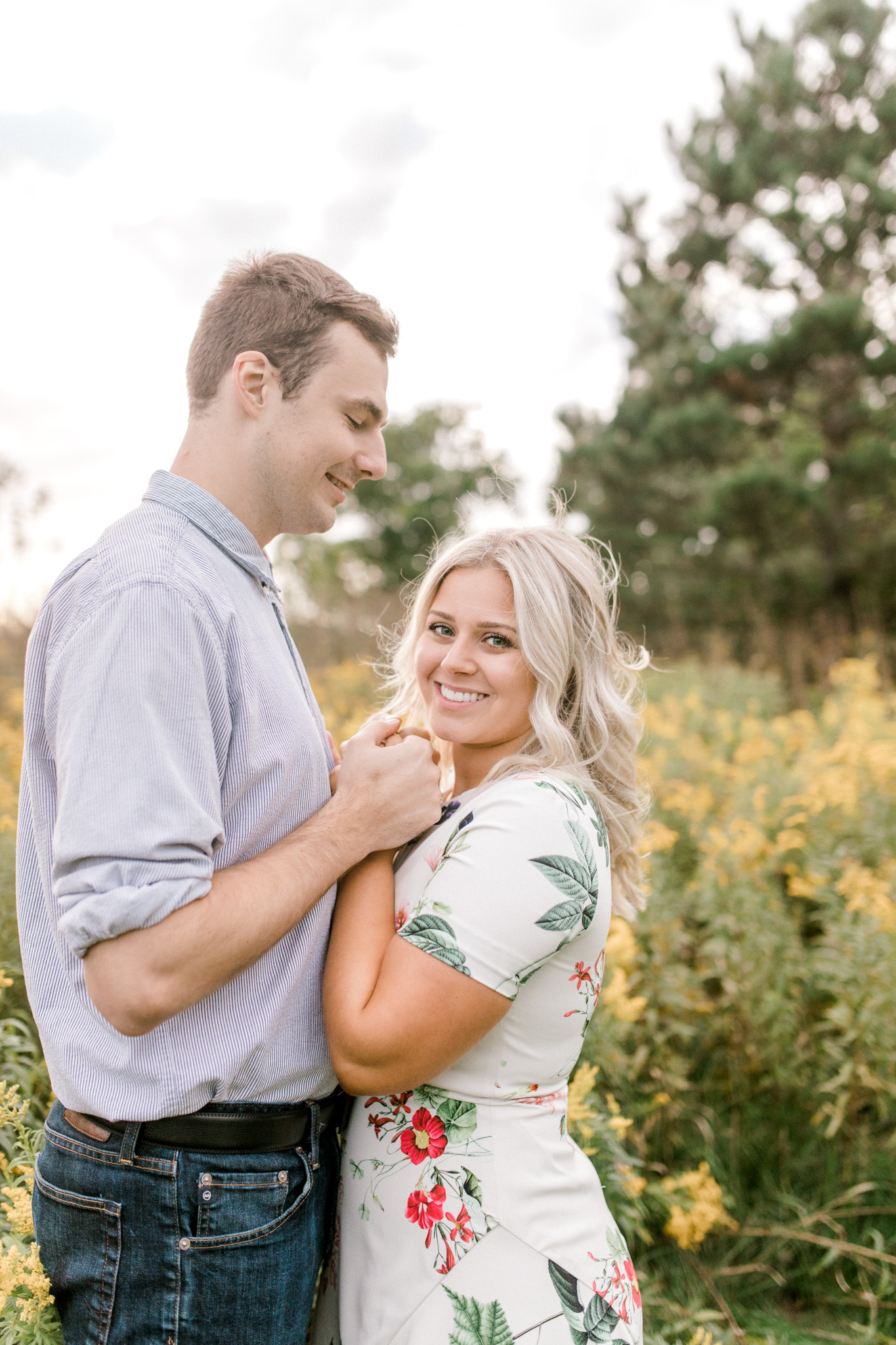 Summer engagement session | Wildflowers | Field engagement session | Floral Engagement Dress | West Michigan Wedding Photography