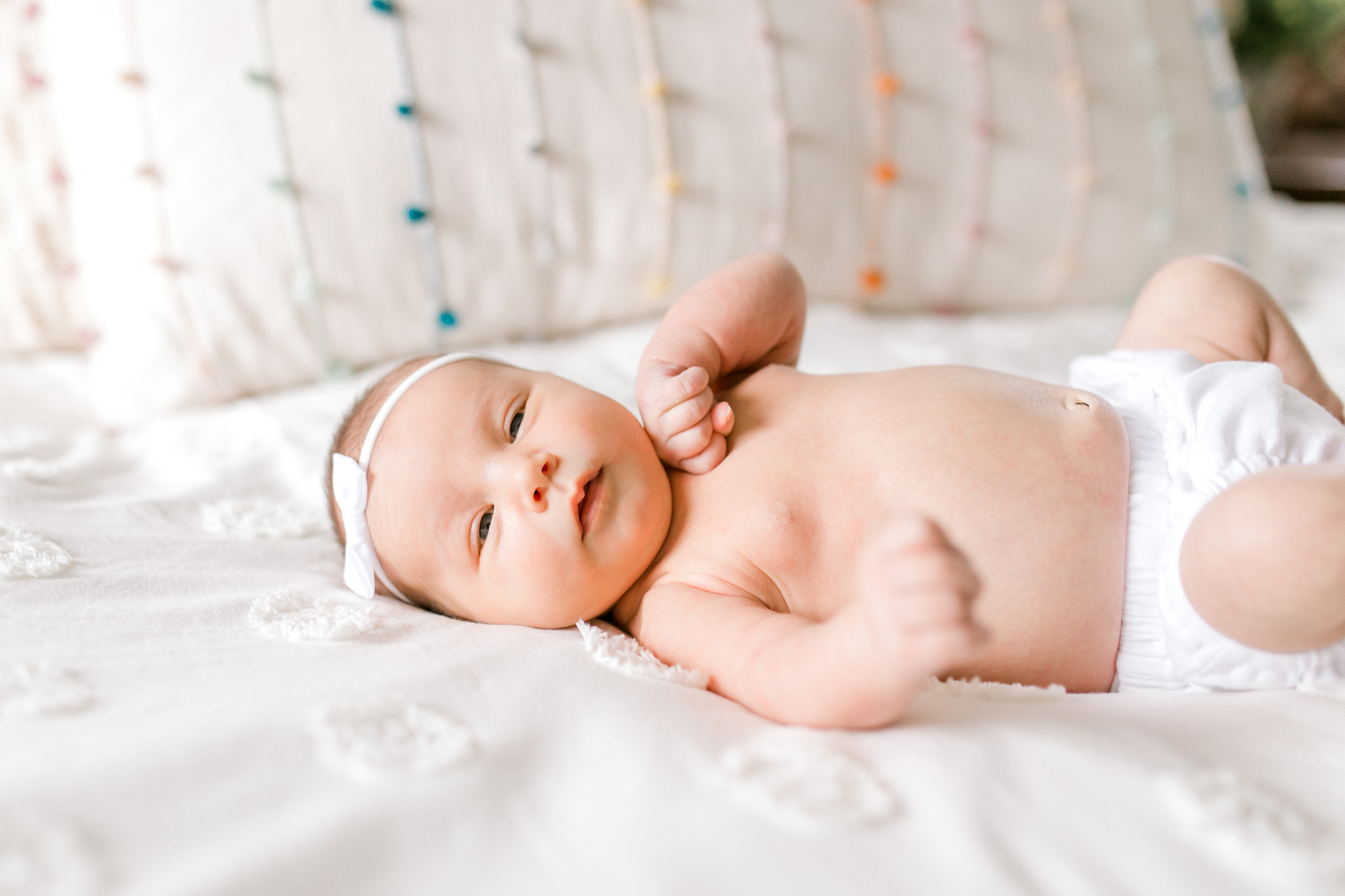 Baby girl in-home lifestyle newborn session | Whimsical colorful nursery | West Michigan Lifestyle Photography