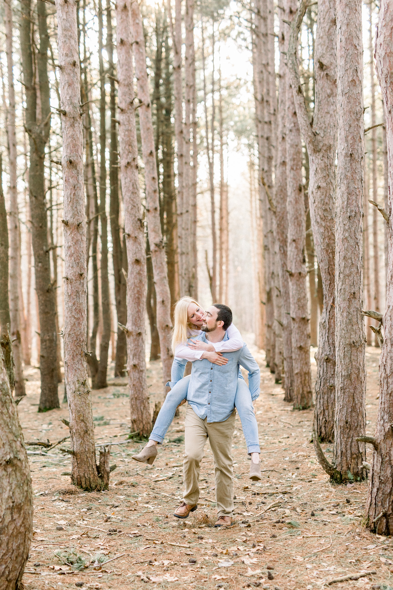 Light Filled Woodland Engagement Session | Light and Airy Photography | Film Inspired |  West Michigan Wedding Photographer