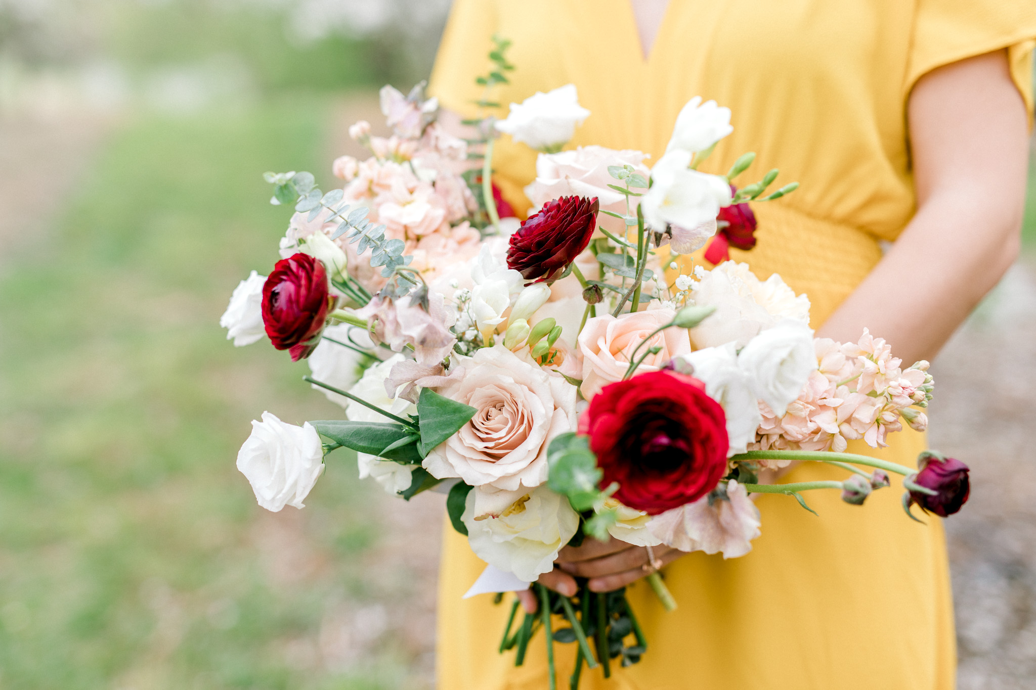 Spring Apple Blossom Engagement Session at the Orchard | Engagement Bouquet | Mustard Yellow Dress | What to Wear to Your Engagement Session | Grand Rapids Wedding Photographer