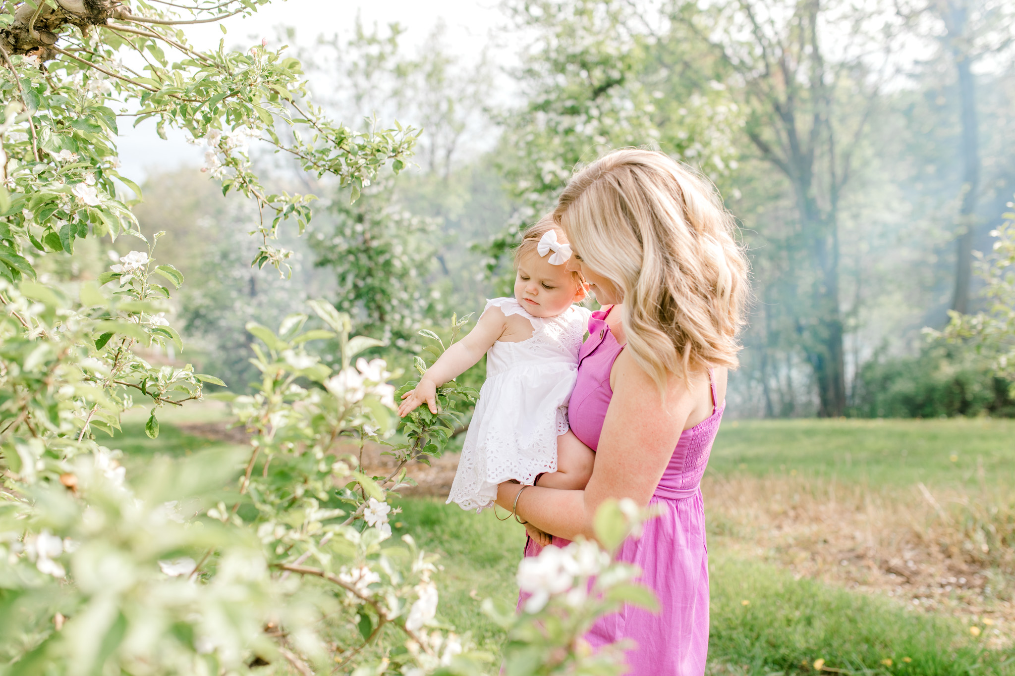 Baby Girl One Year Birthday Session at the Orchard | Spring Apple Blossom Session | Lifestyle Photography | Light &amp; Airy Photography | West Michigan Photographer