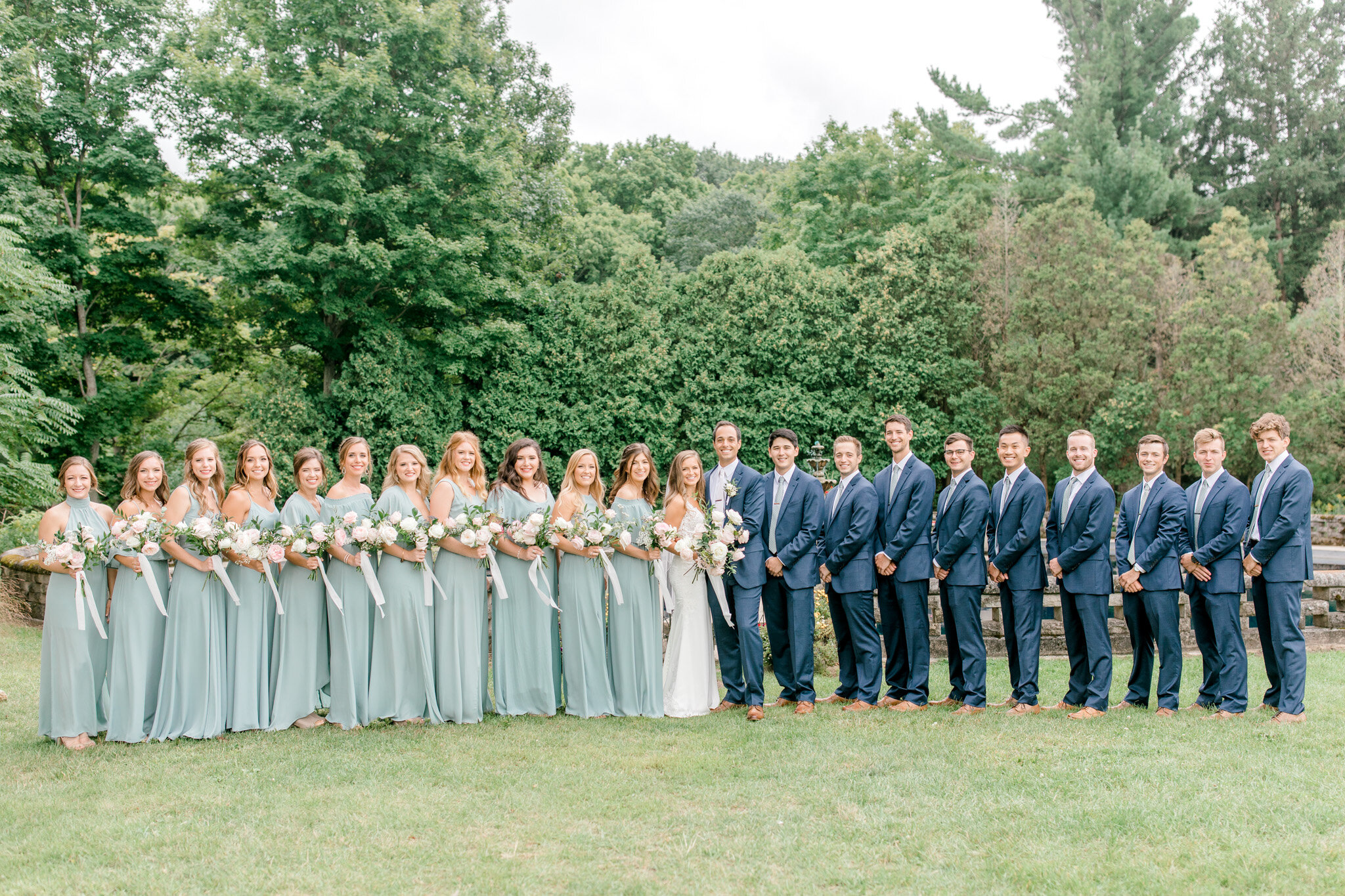 Outdoor Michigan Wedding at The Felt Estate | Wild deer photobombs golden hour portraits and eats the brides bouquet | Laurenda Marie Photography