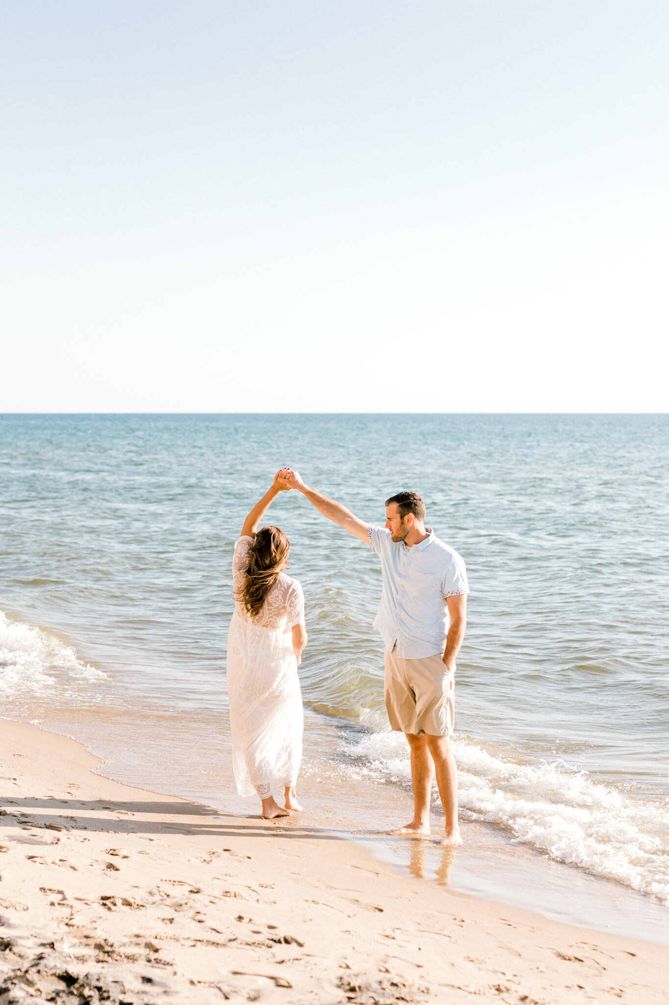 Golden Hour Maternity Session on Lake Michigan | Light &amp; Airy Michigan Lifestyle Photographer