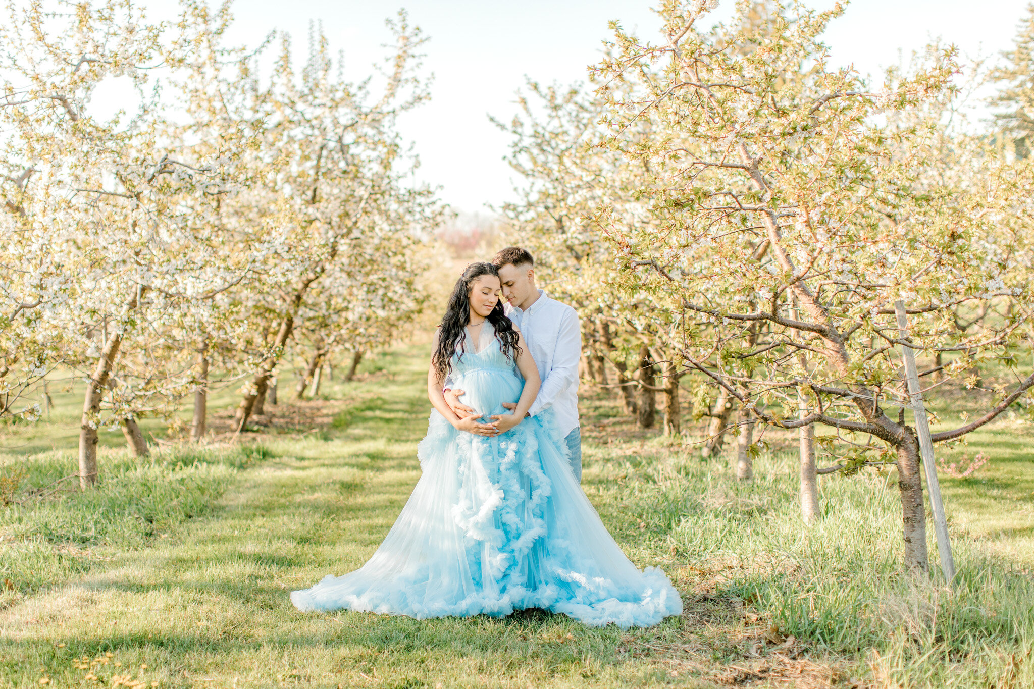 Spring Maternity Session in the Apple Blossoms | West Michigan Maternity Photographer