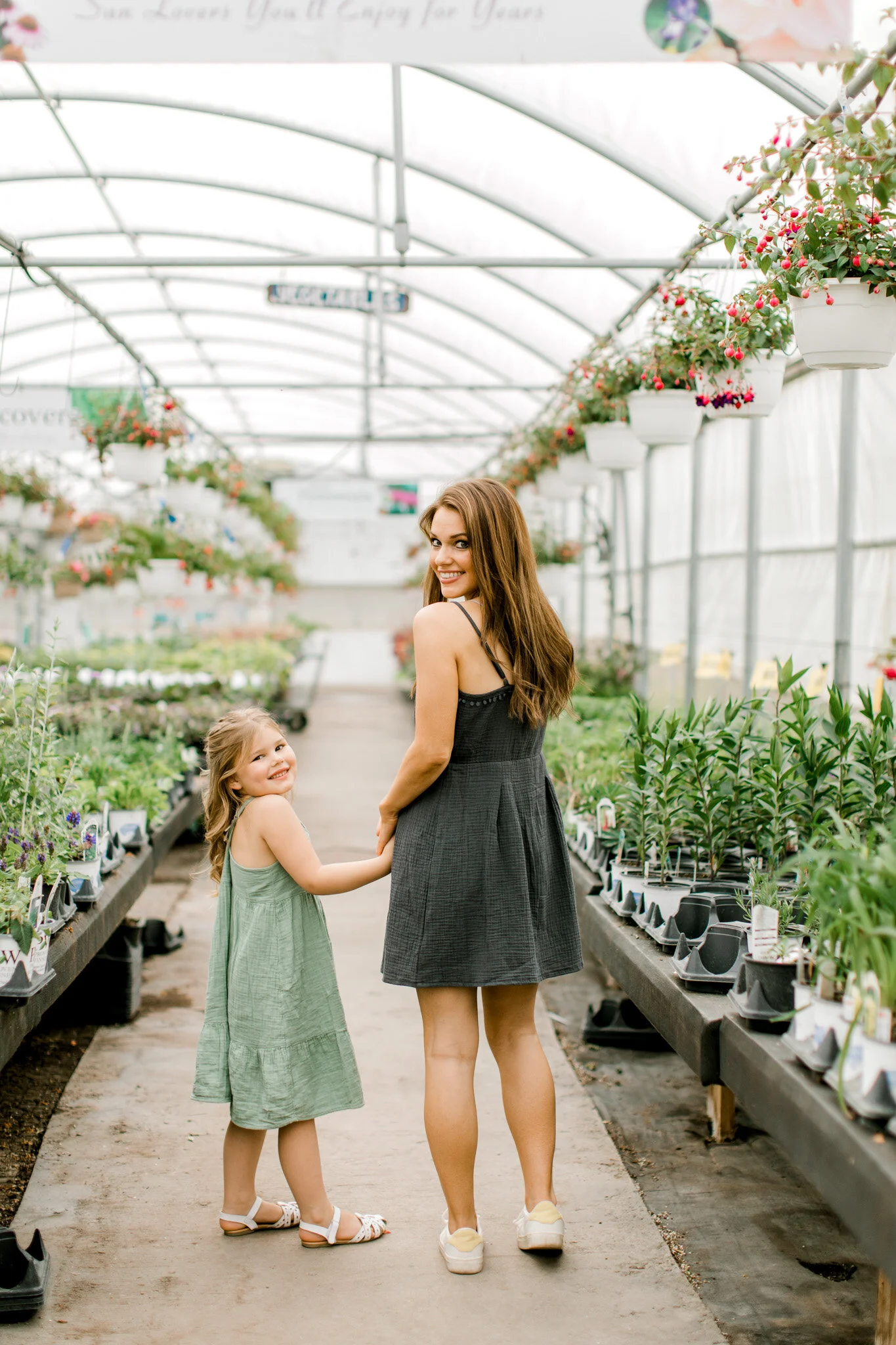 Mommy & daughter session at a greenhouse nursery | West Michigan Family Photographer | Mommy & me