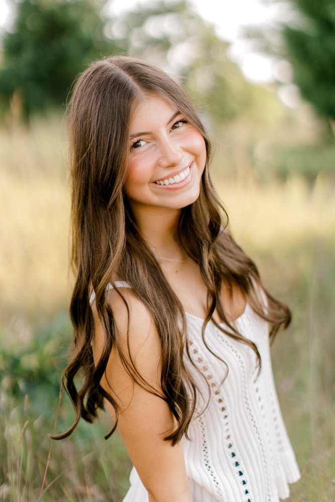 Senior girl portrait session | West Michigan Senior Photos | Wildflower field senior photos | Laurenda Marie Photography | Grand Rapids Photographer
