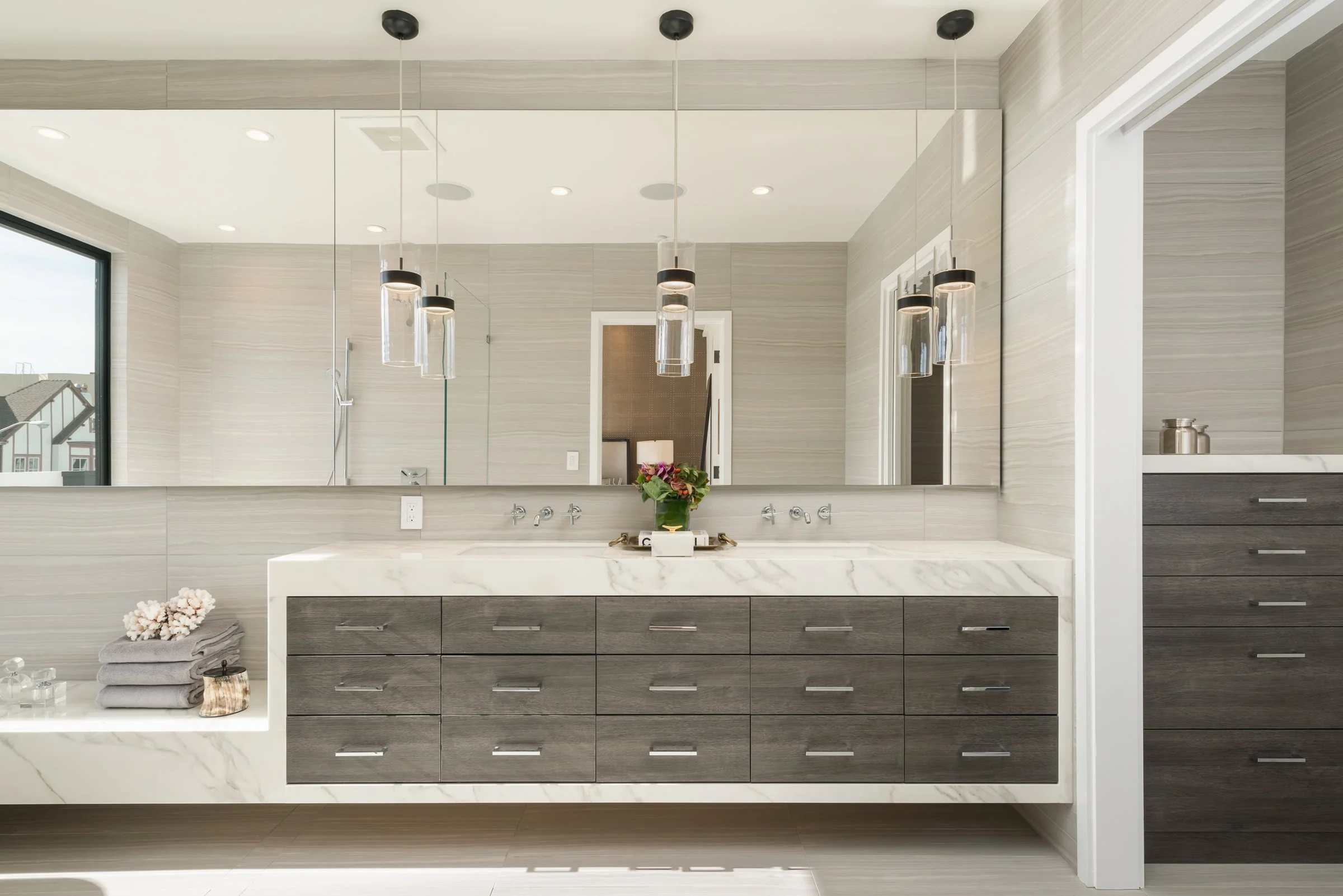 Modern bathroom with a floating double vanity and large mirror, JL Interior Design