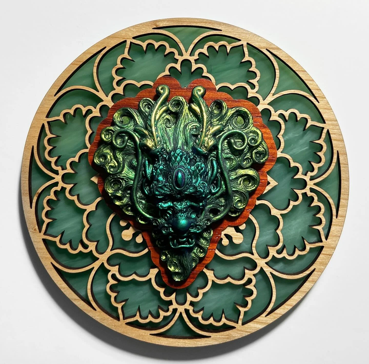 I still have some wall hanging dragon guardians available though @valkariegallery! The dragons are cast in resin with chameleon color shifting pigment powders, and come from the original mold used to cast my bronze dragons from the Year of the Dragon