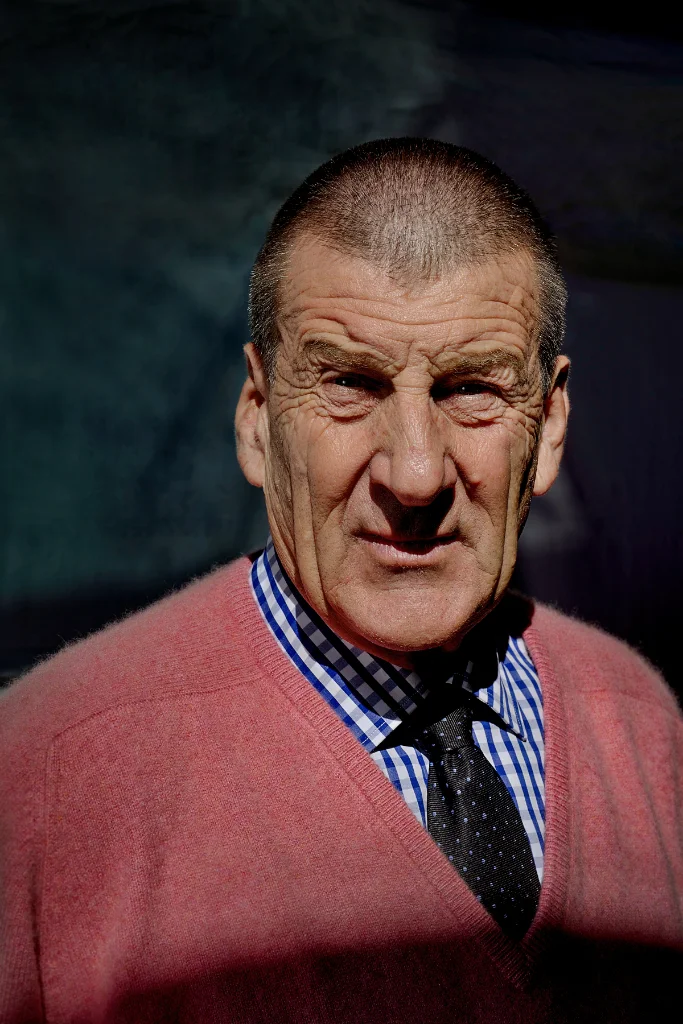 Old Man Poses For Headshot Photo