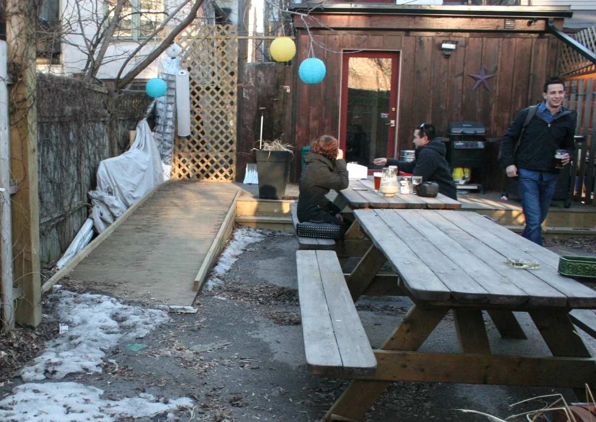 Picture of accessible patio seating and ramp.