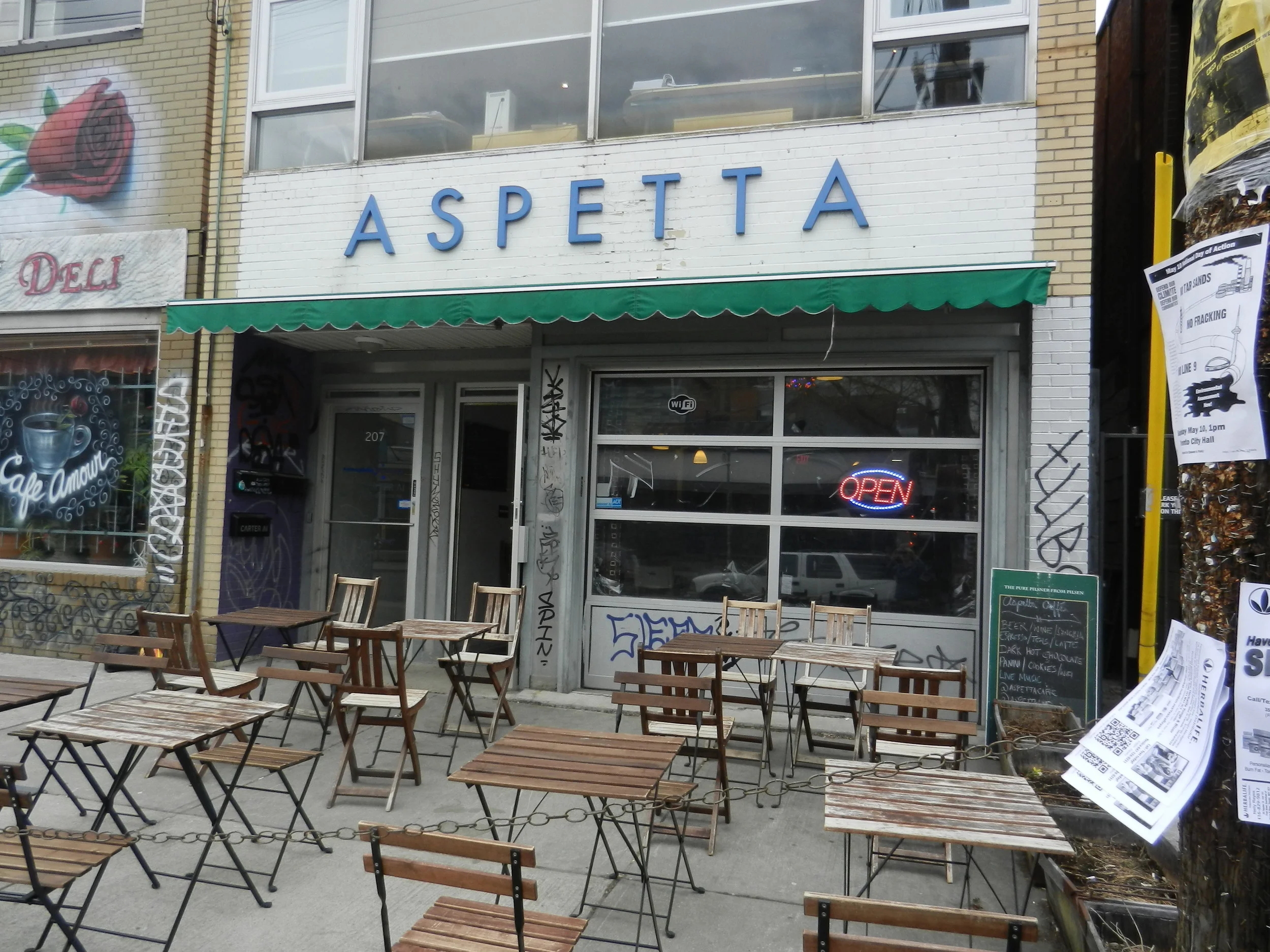 Picture of the accessible front entrance and outdoor seating.