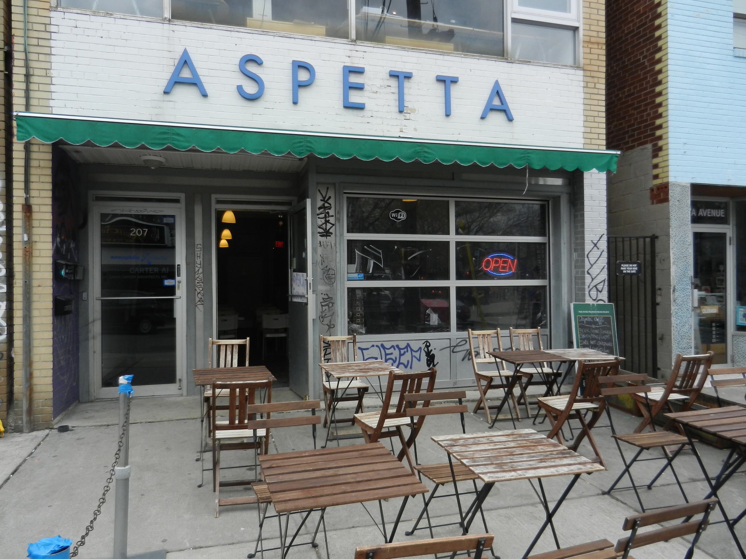 Picture of sidewalk patio and main entrance