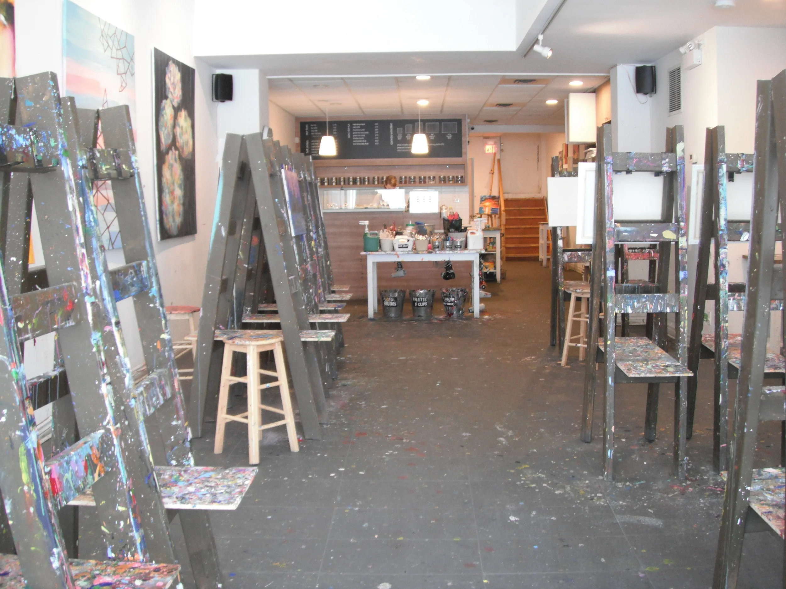 Image of accessible interior with paint easels.