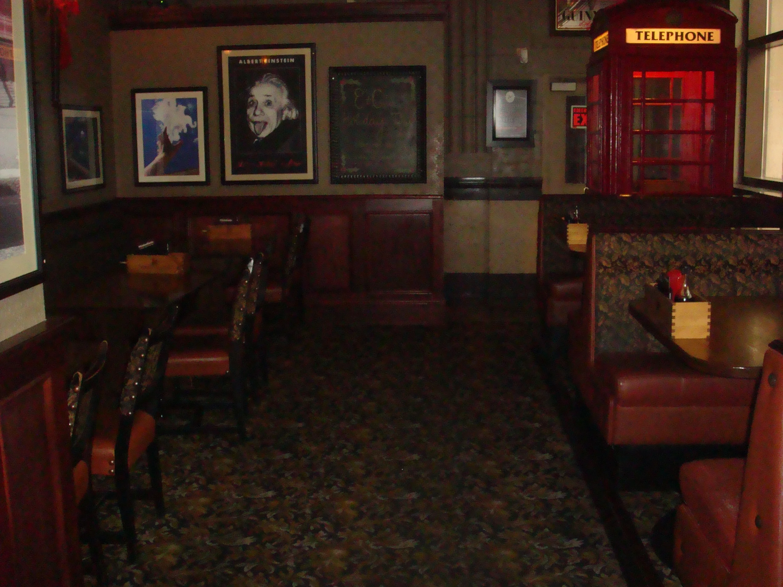 Picture of accessible interior of restaurant. Carpeted floors.