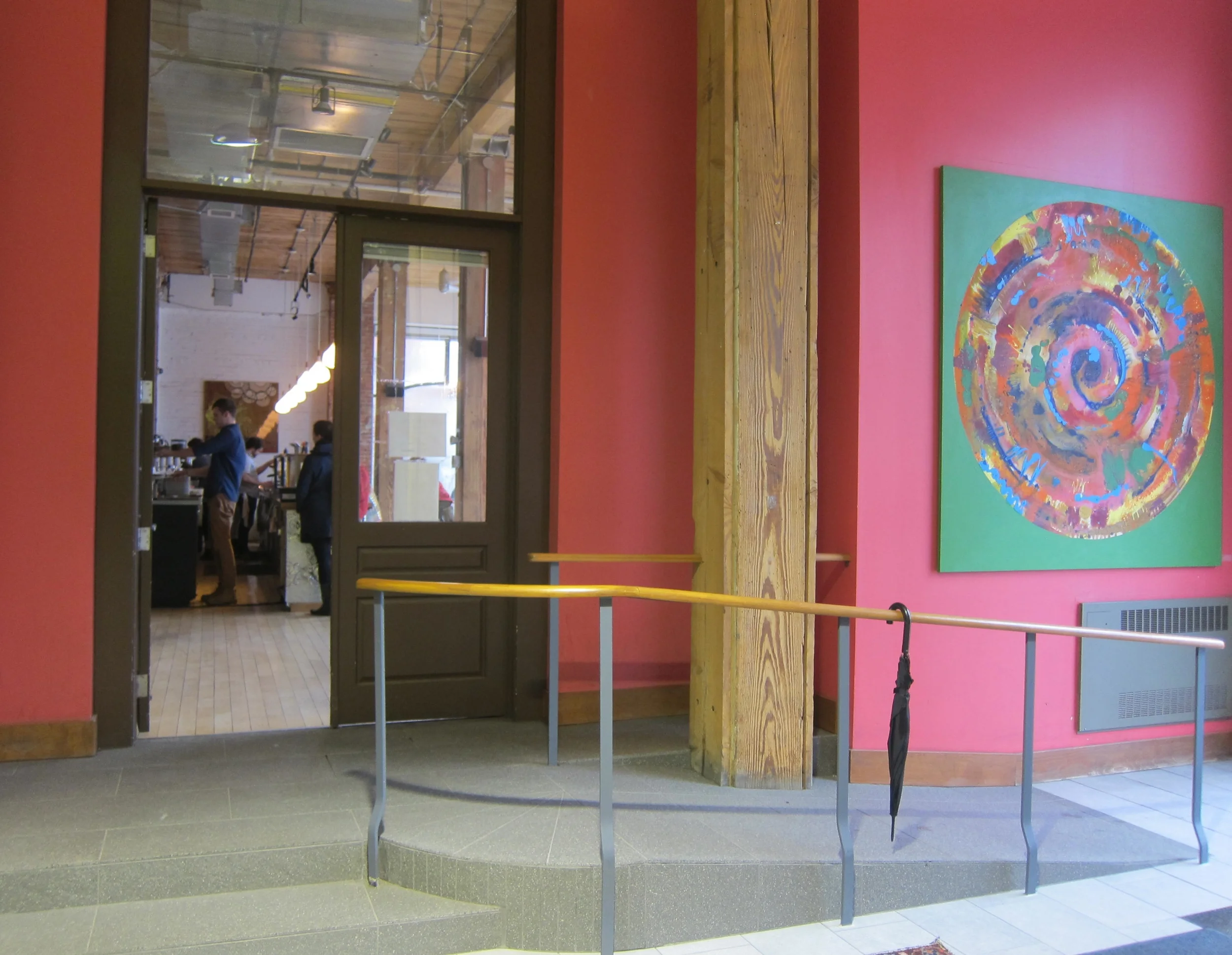 Picture of accessible entrance. Ramp to the right.