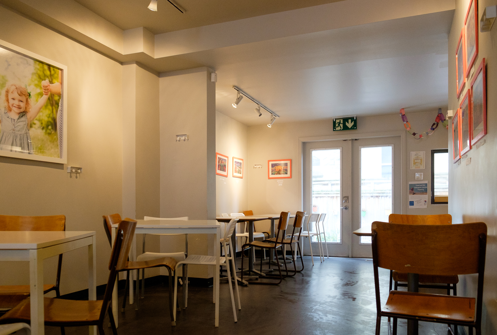back half of cafe with door leading to patio