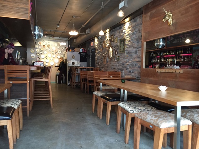 Picture of accessible interior of restaurant. Wide pathway featured.