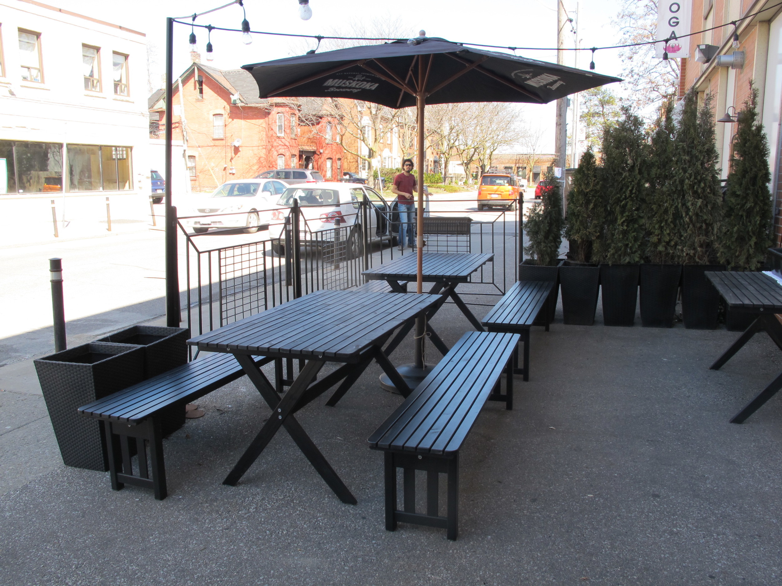 Picture of picnic table on accessible patio from sidewalk level