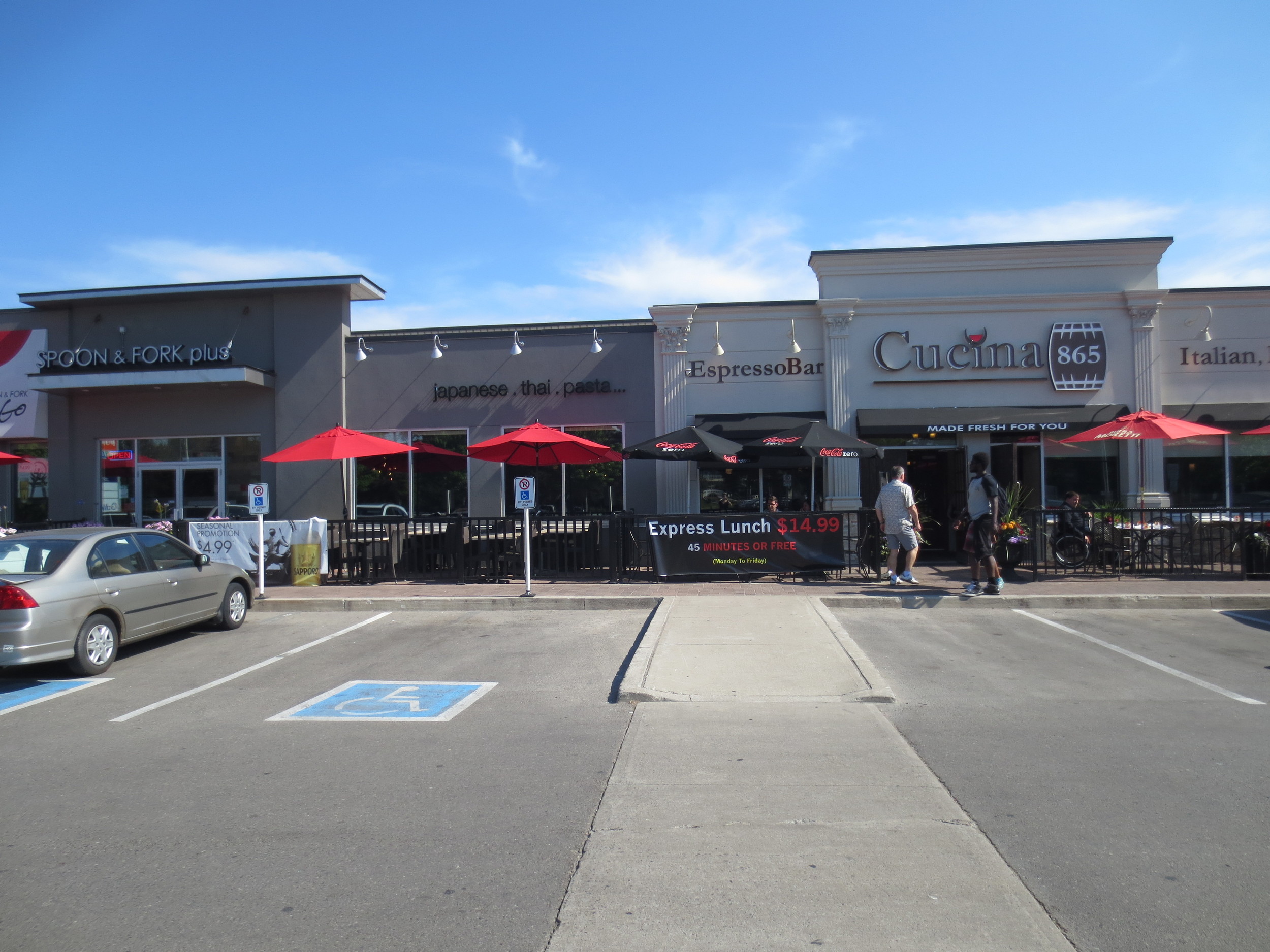 Picture of entrance and accessible parking spaces
