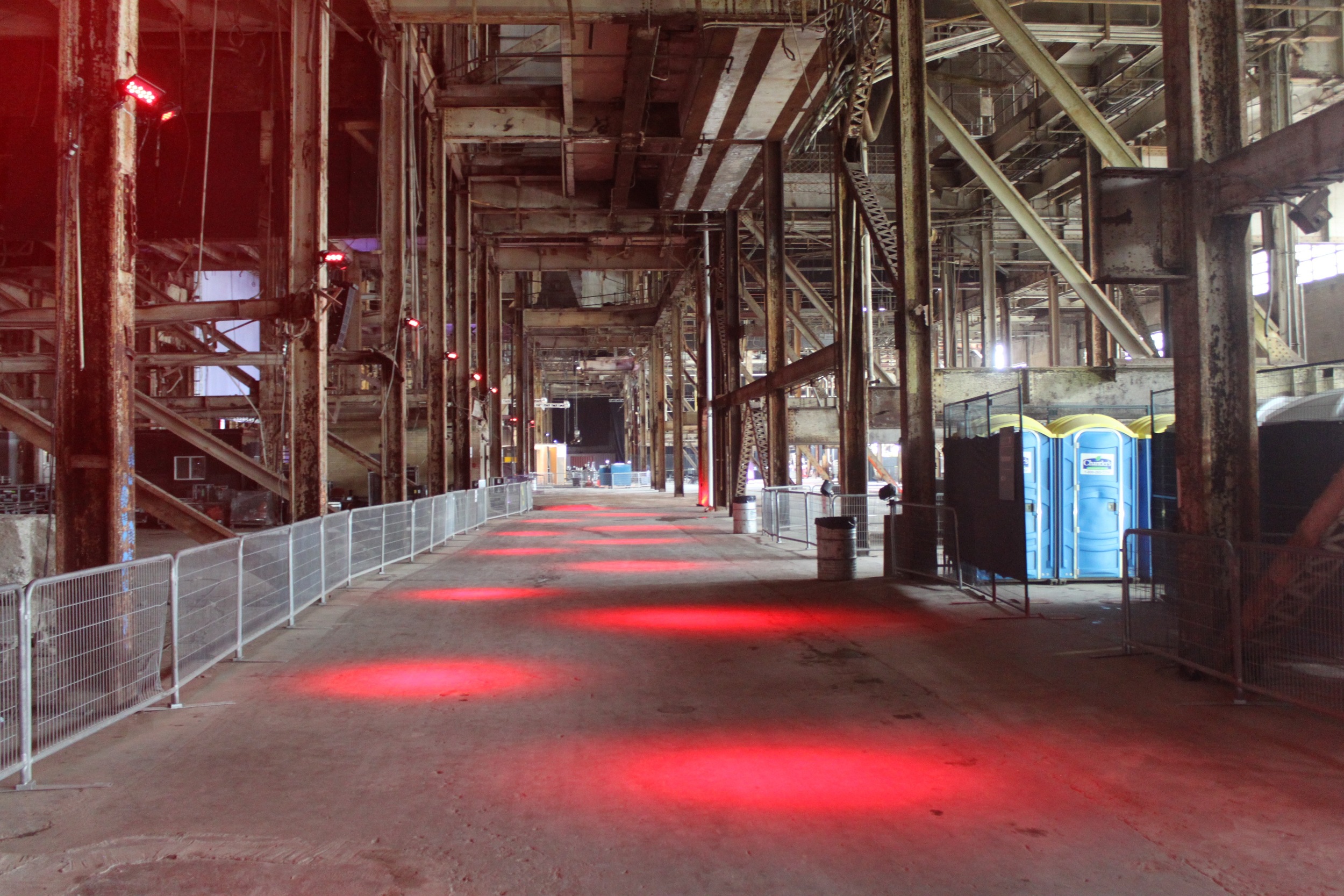 Picture of interior of the Hearn. Red spotlights are featured on the floor