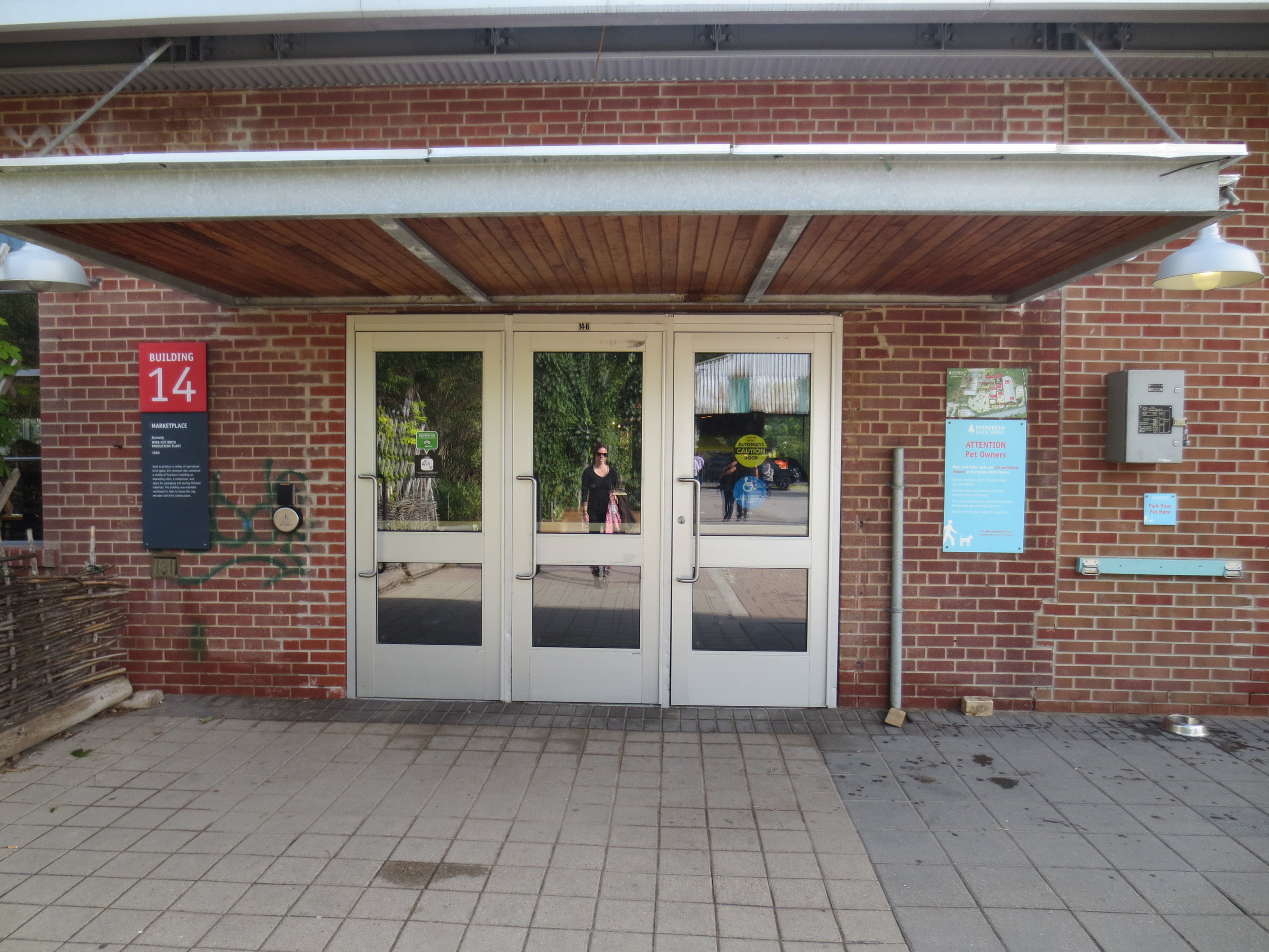 Picture of the main entrance showing automatic button