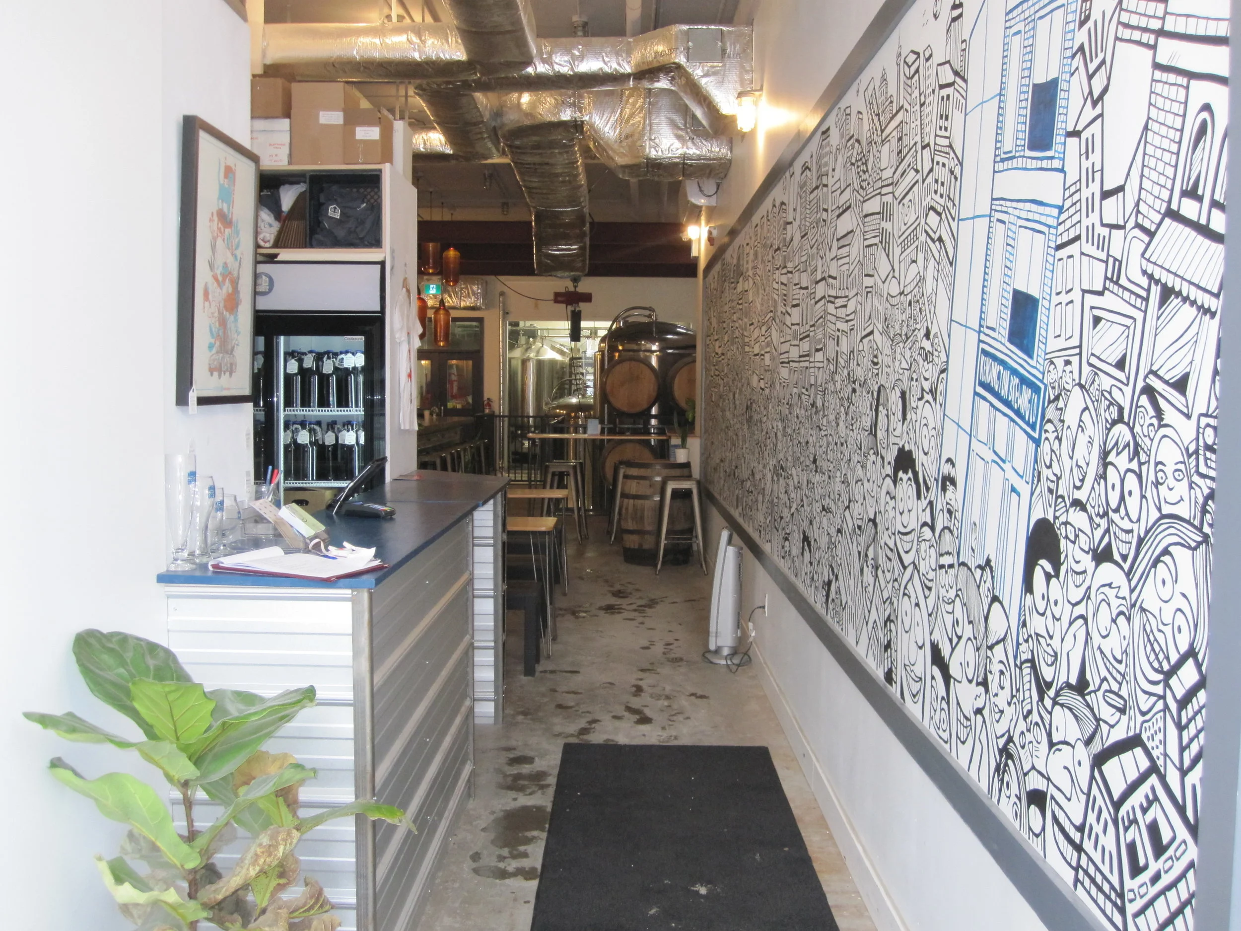 Picture of interior hallway and counter of the brewery