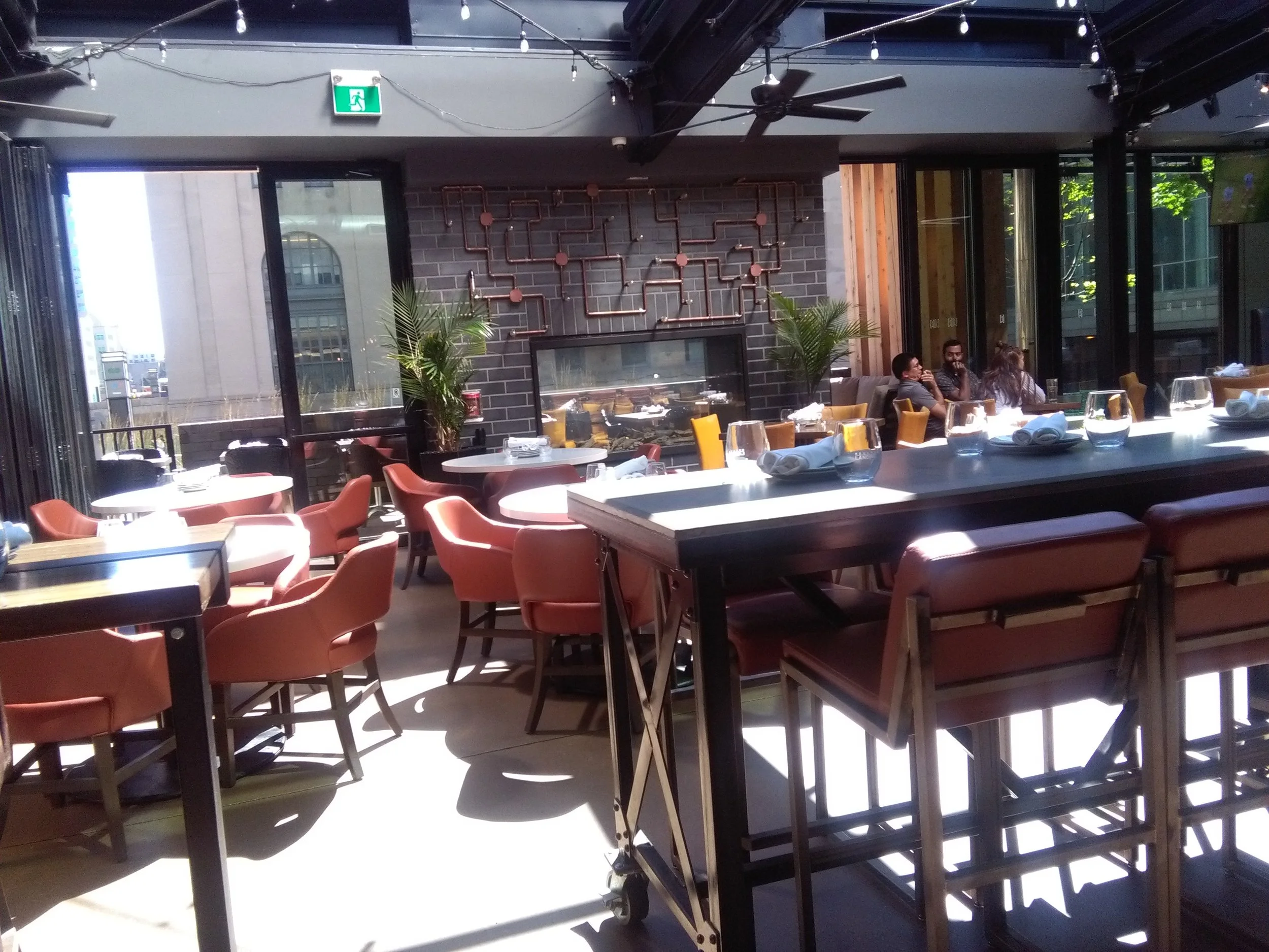 Picture of accessible, standard height tables at Kellys Landing