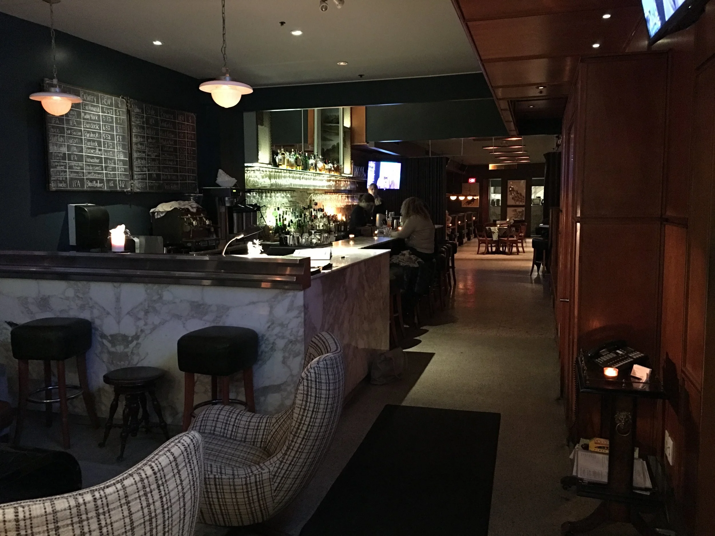 Picture of the bar and pathway to the dining area of the Peacock